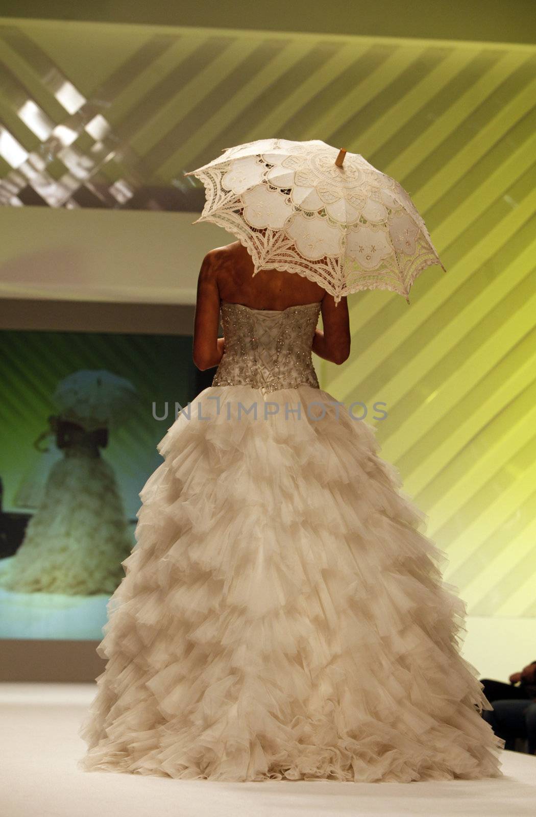 ZAGREB, CROATIA - FEBRUARY 19: Fashion model walks the runway in wedding dress on 'Wedding days' show, February 19, 2012 in Zagreb, Croatia.