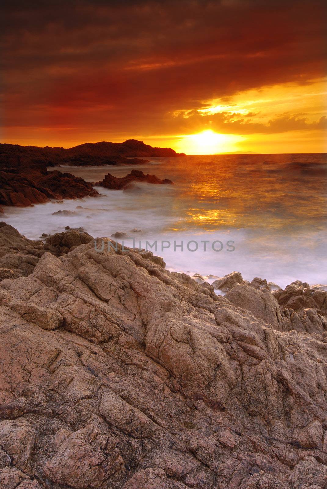 Beautiful sunset over the sea on Sardinia, Italy