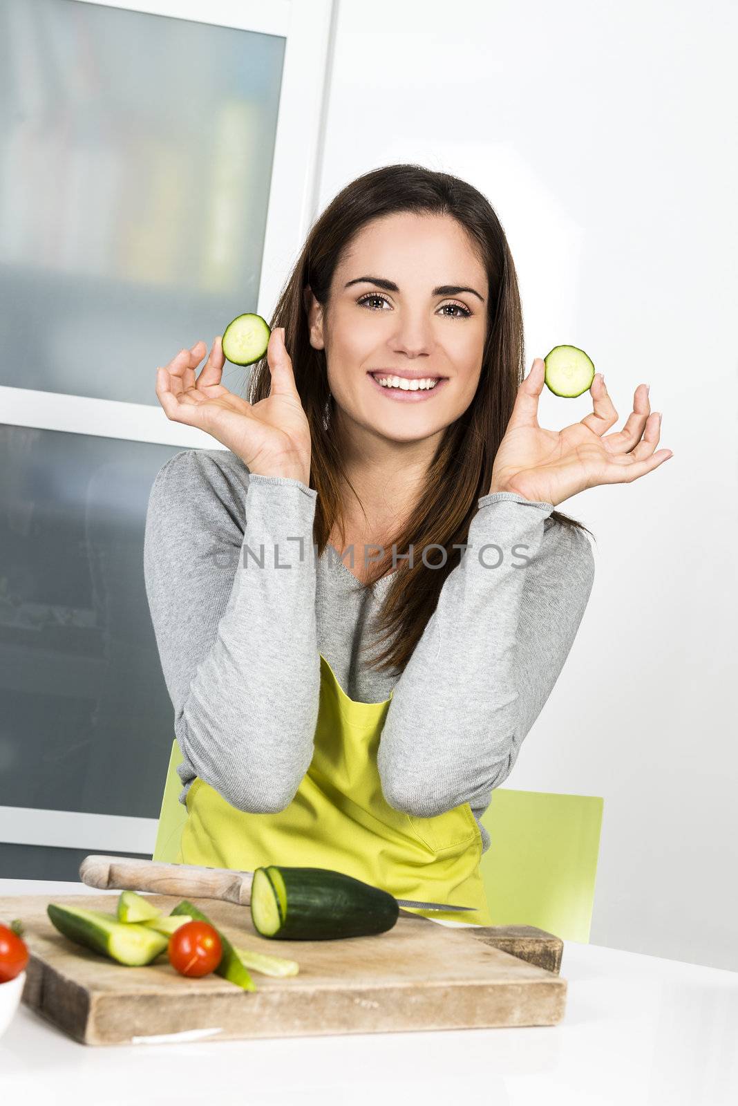 Young Woman Cooking. Healthy Food - Vegetable Salad. Diet. Dieting Concept. Healthy Lifestyle. Cooking At Home. Prepare Food 