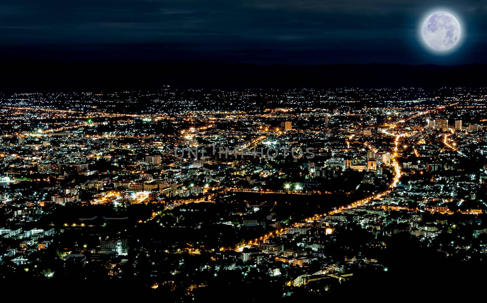 Lights of city in night time scene with blue moon in thailand by moggara12