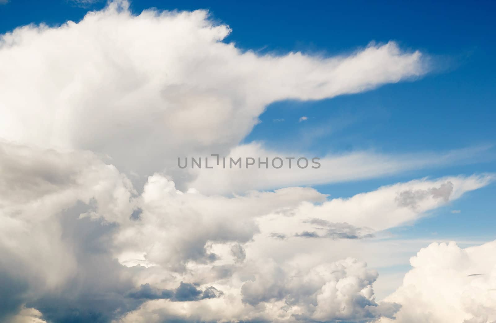 blue summer sky with big white clouds