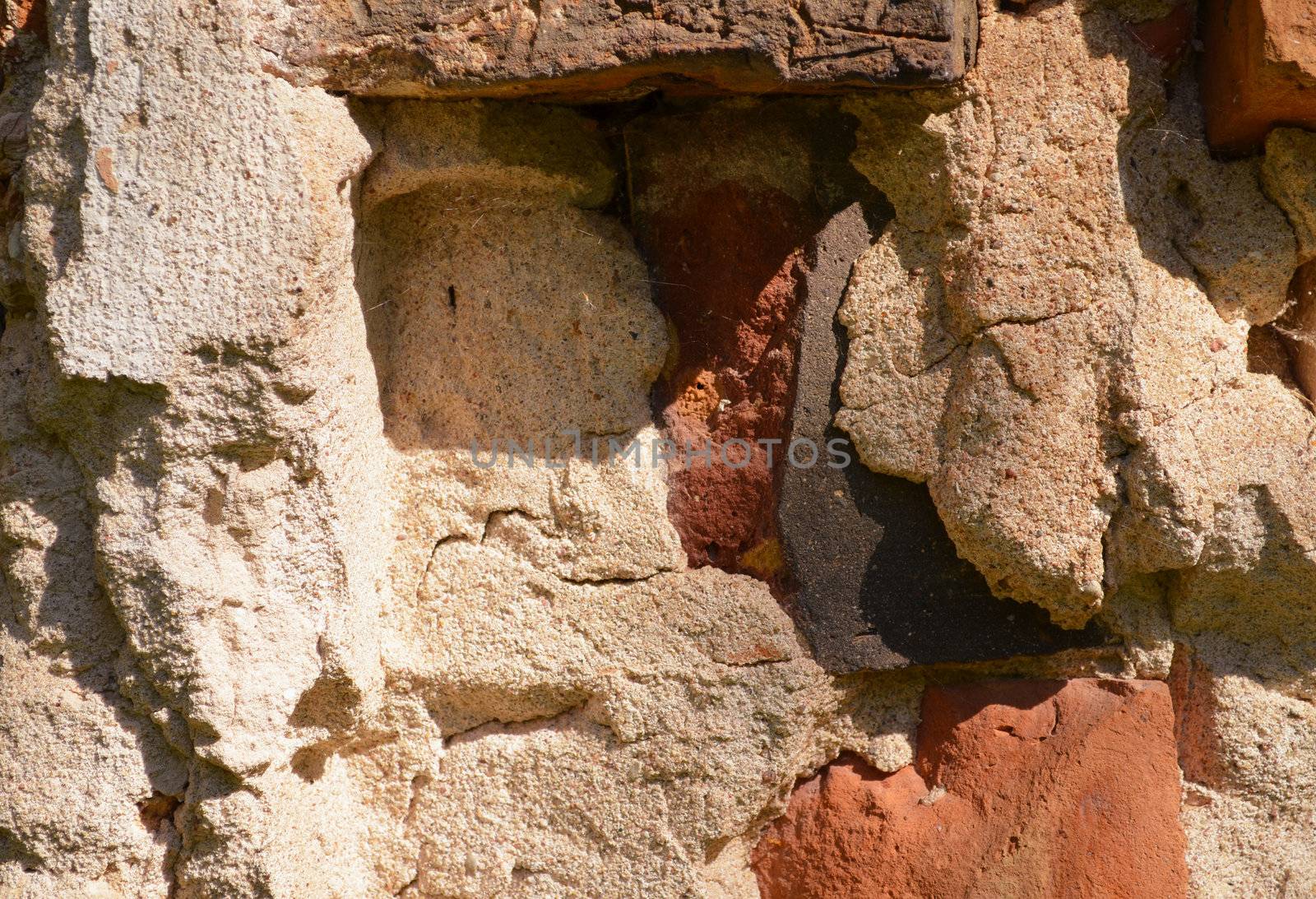 Background of ancient masonry concrete brick abandoned wall.