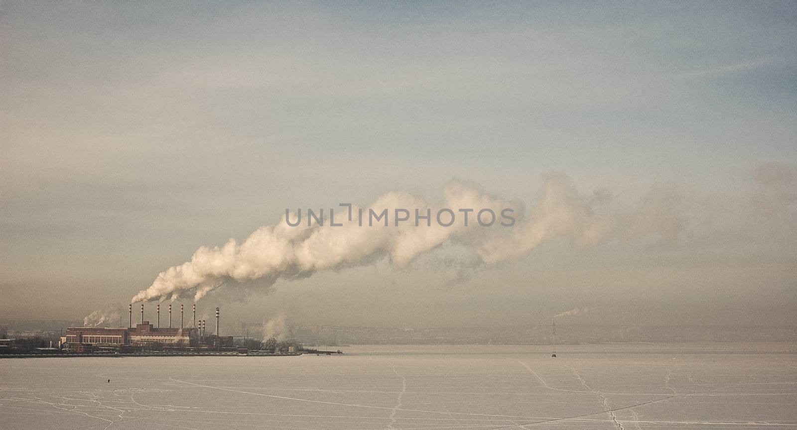 processing plant on the shore of the pond