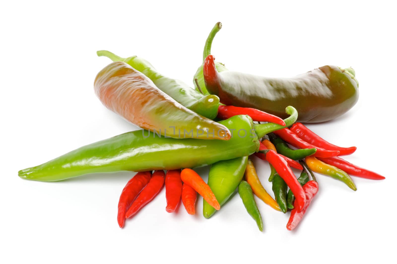 Heap of Big and mini green and red Chili Peppers isolated on white background