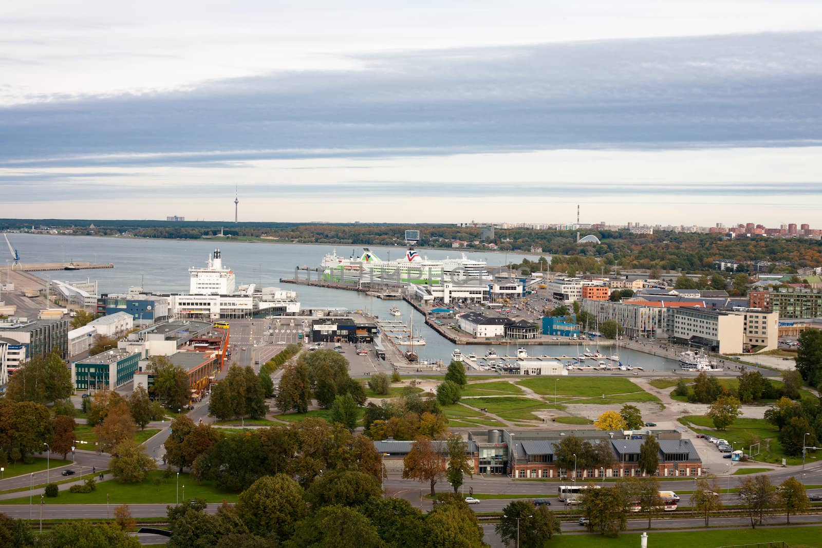 A Tallin view with modern buildings and sea 
