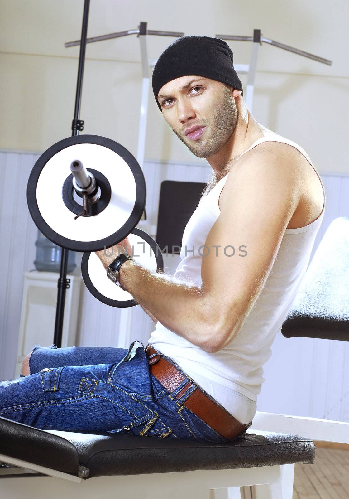 handsome man takes exercises by ssuaphoto