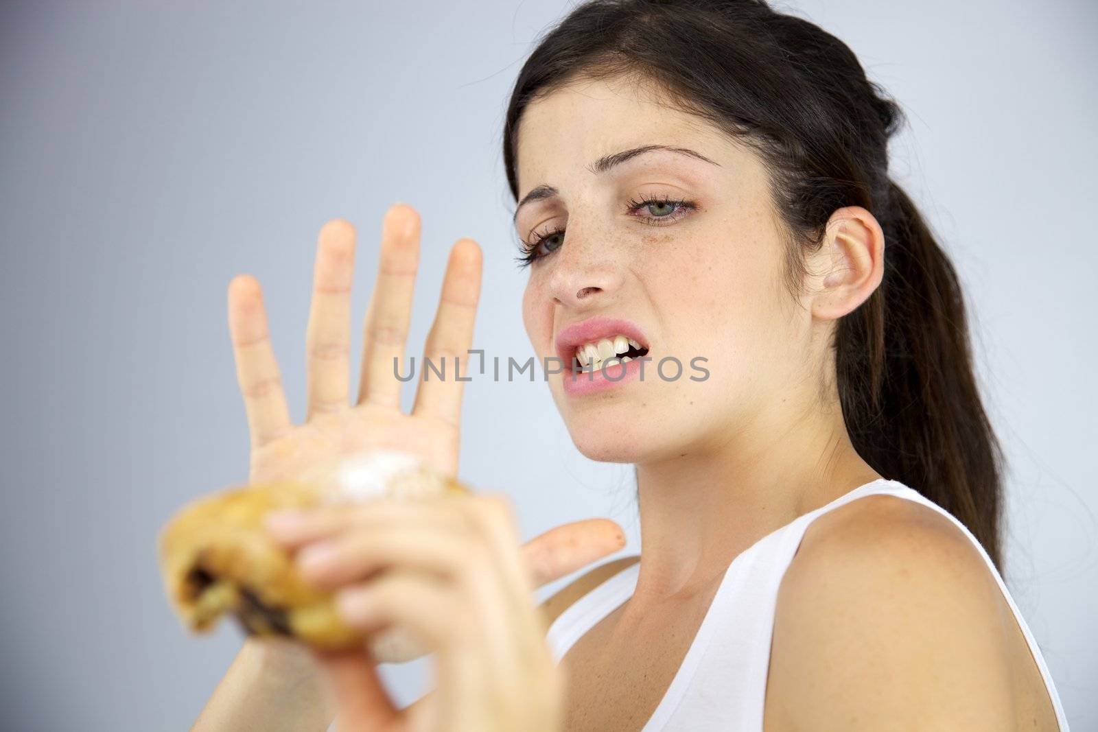 Woman scared of chocolate sweet against diet by fmarsicano