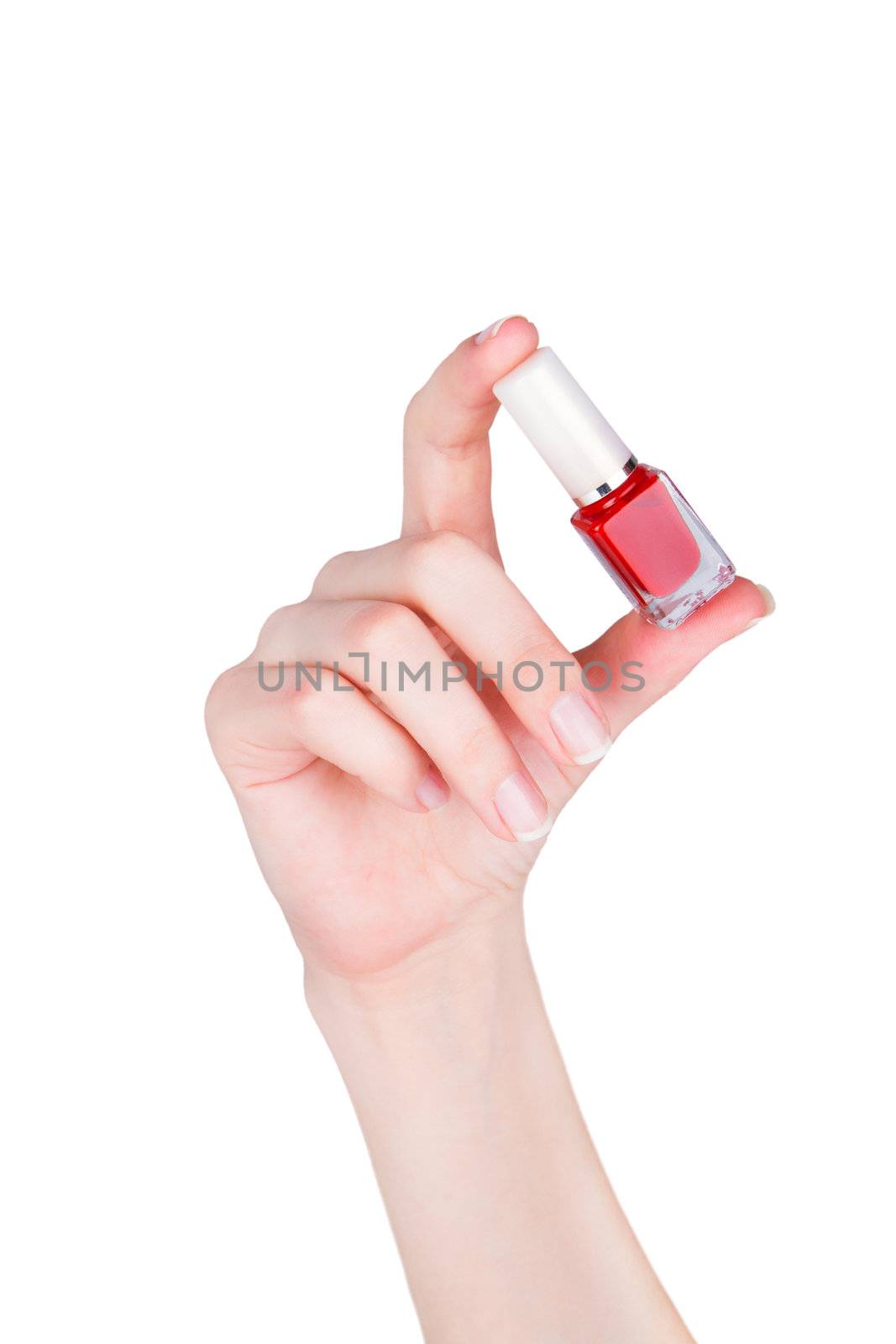 Young woman showing bottles of colored nail polish