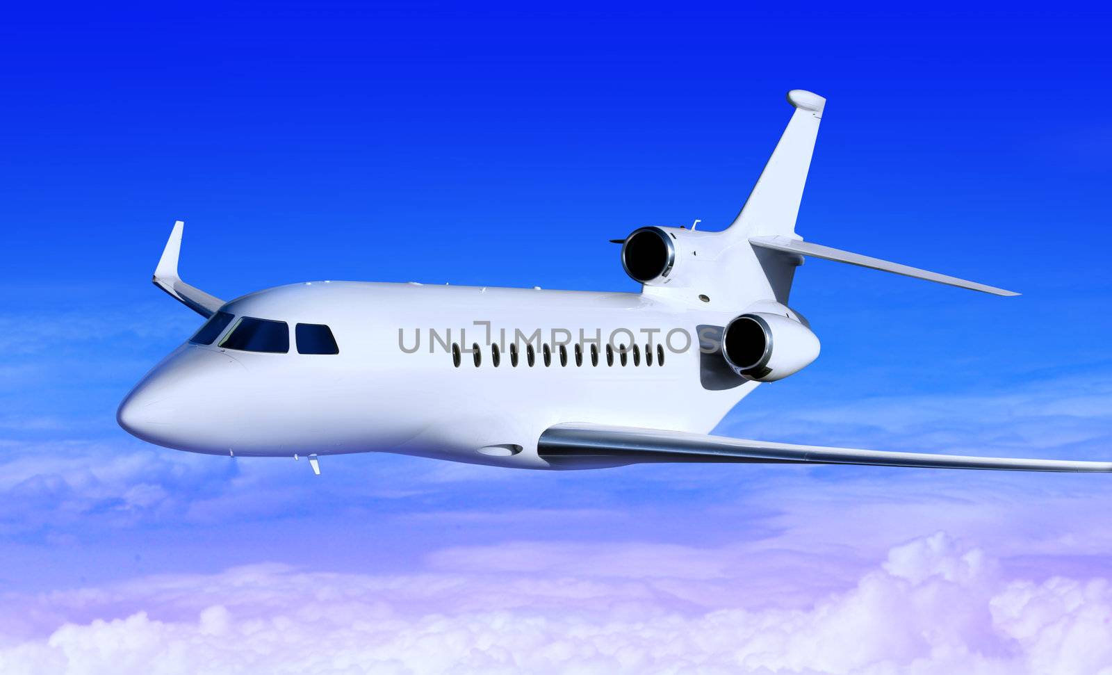private white jet plane in the blue sky