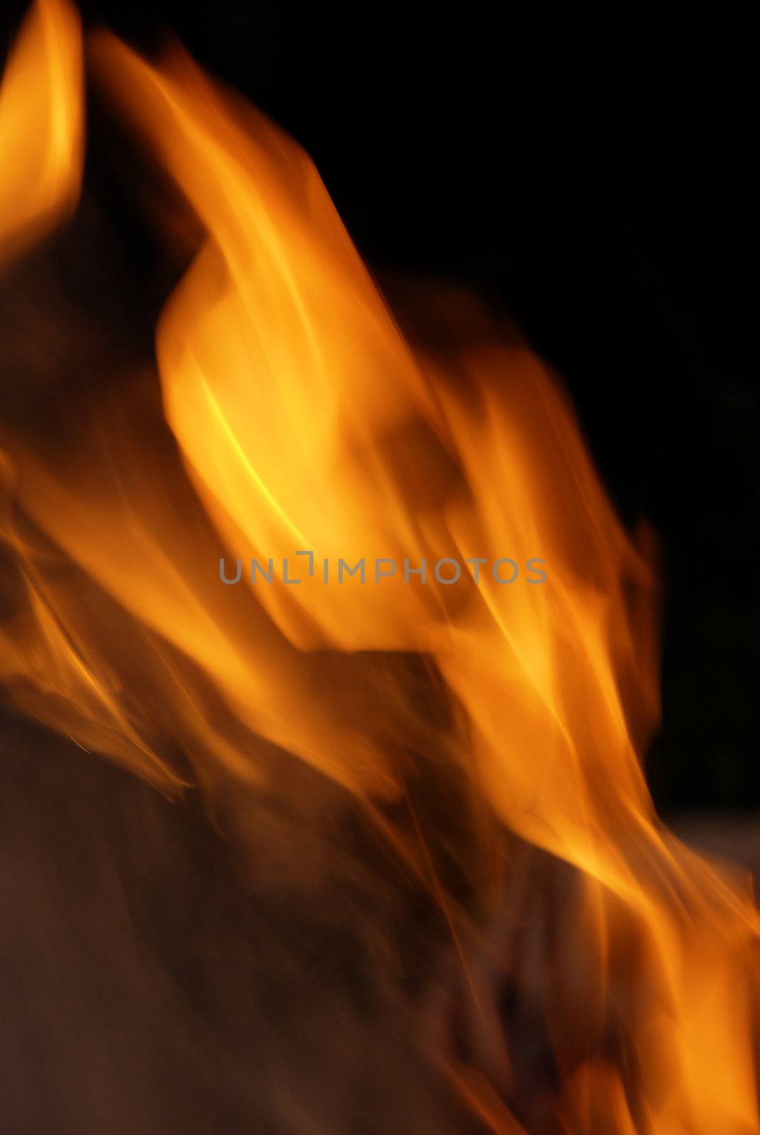 Detail of dangerous flames isolated on black background