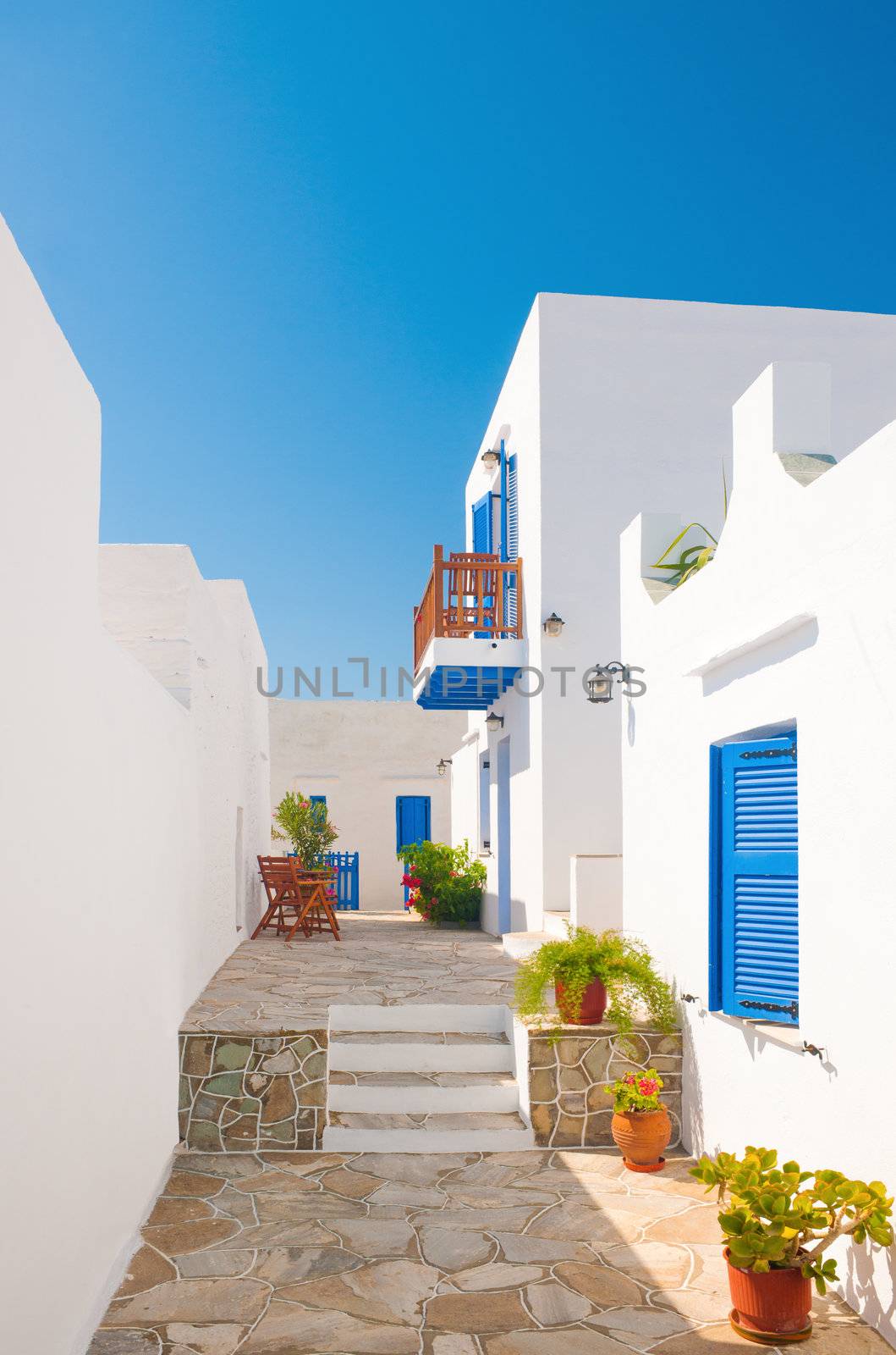 Colorful alleyway from a town on the island of Sifnos, Greece