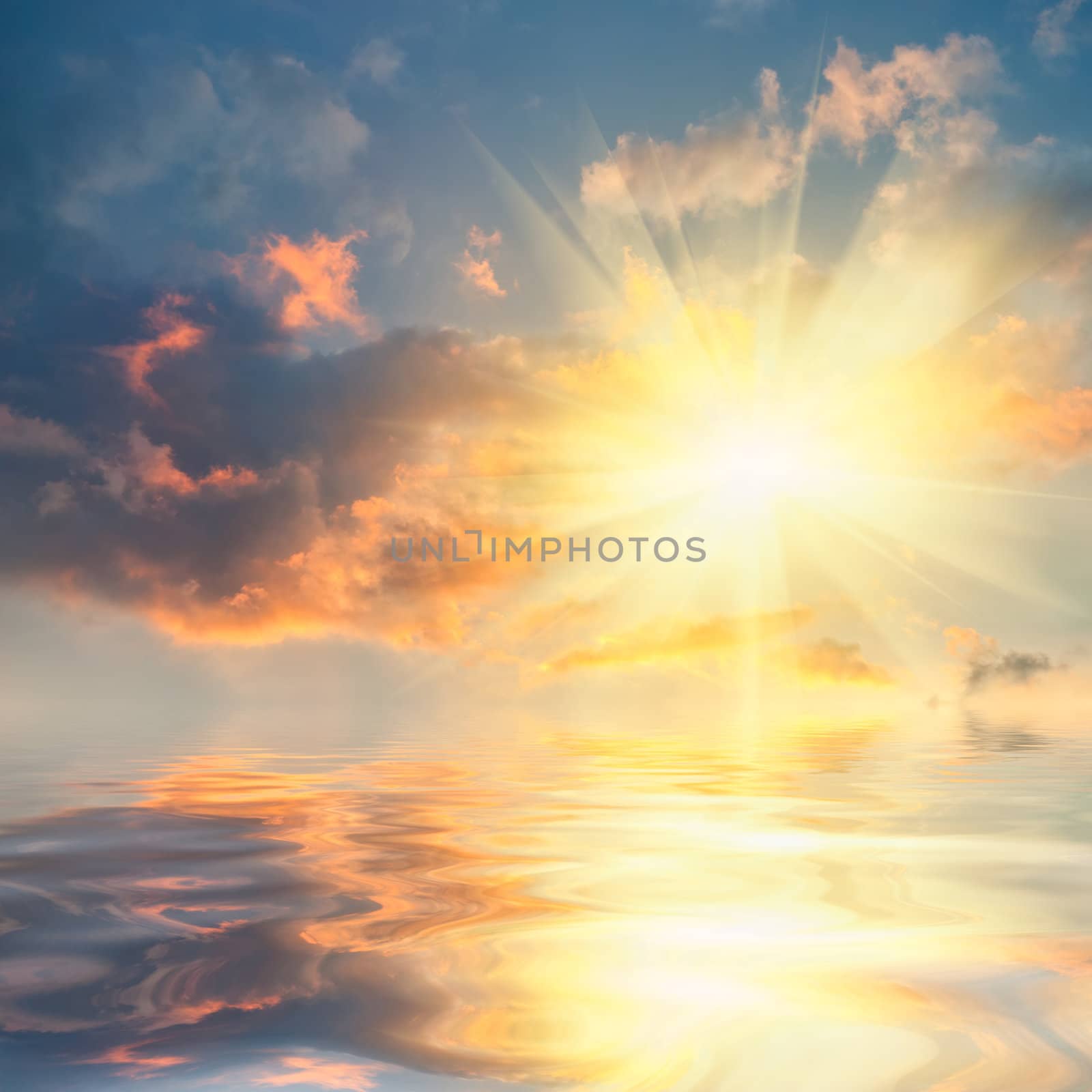 Beautiful sunset over sea with reflection in water, colorful clouds in the sky