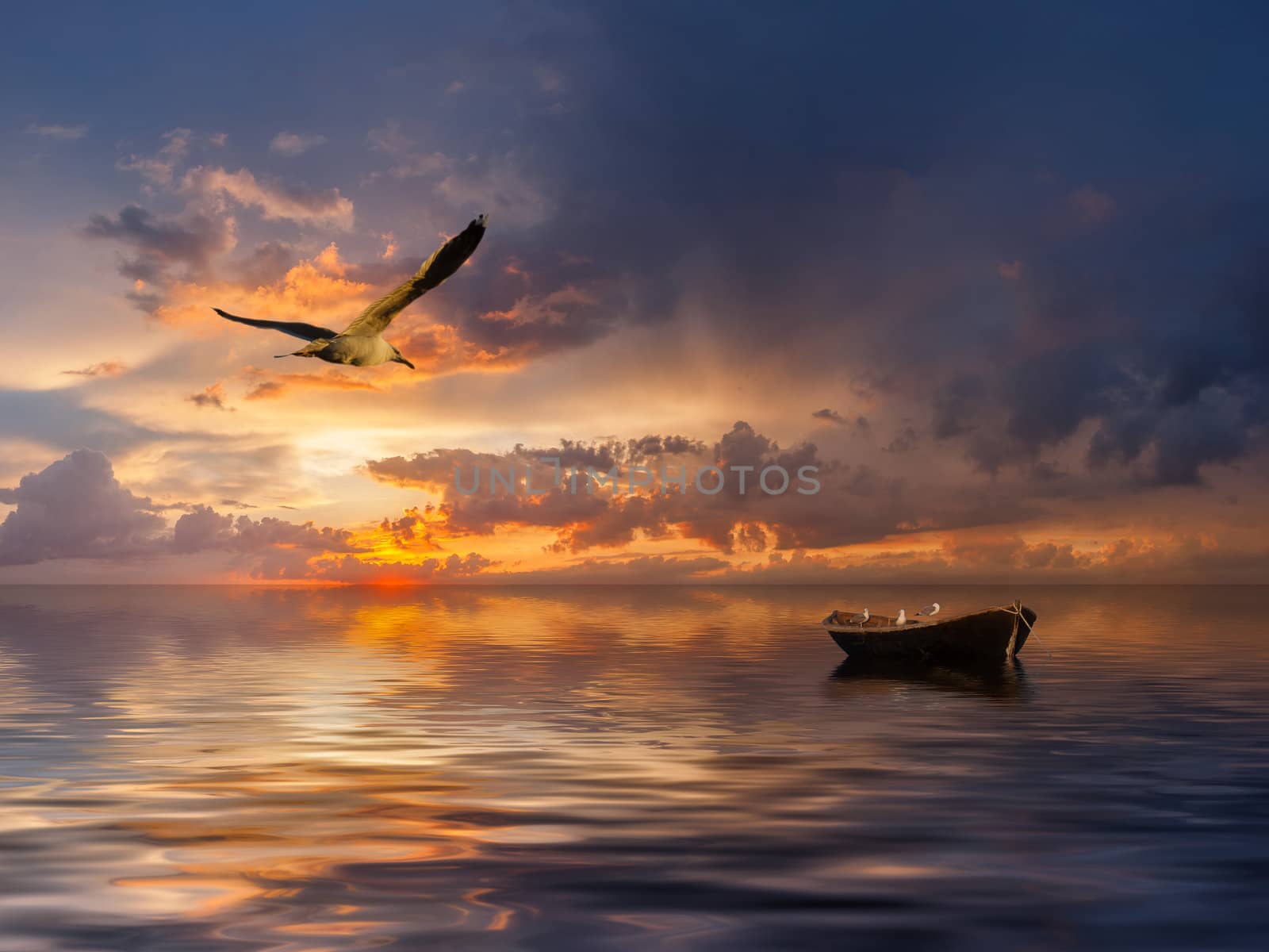 Beautiful landscape with lonely boat and birds against a sunset, majestic clouds in the sky