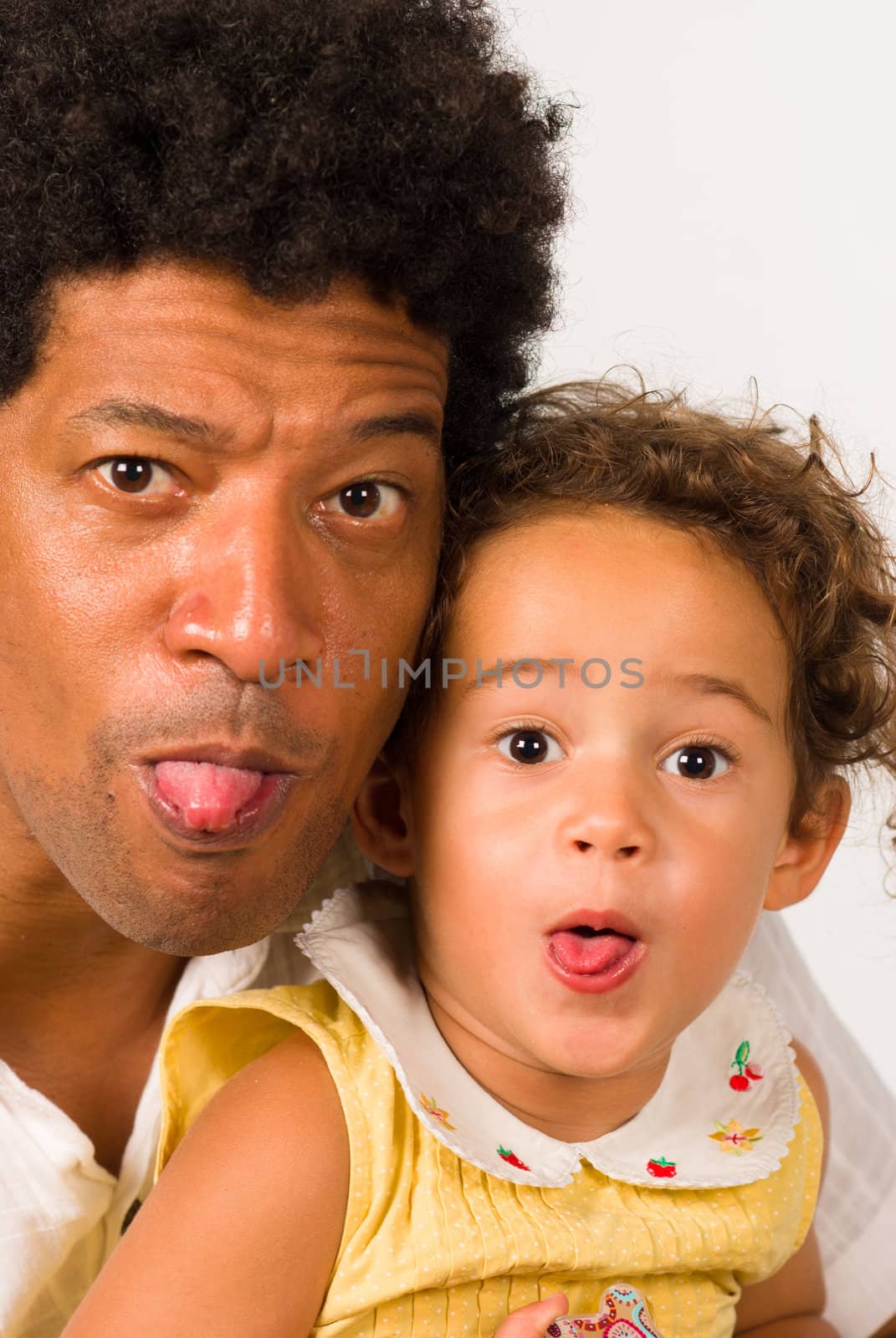 A real naughty dad and daughter sticking out tounge