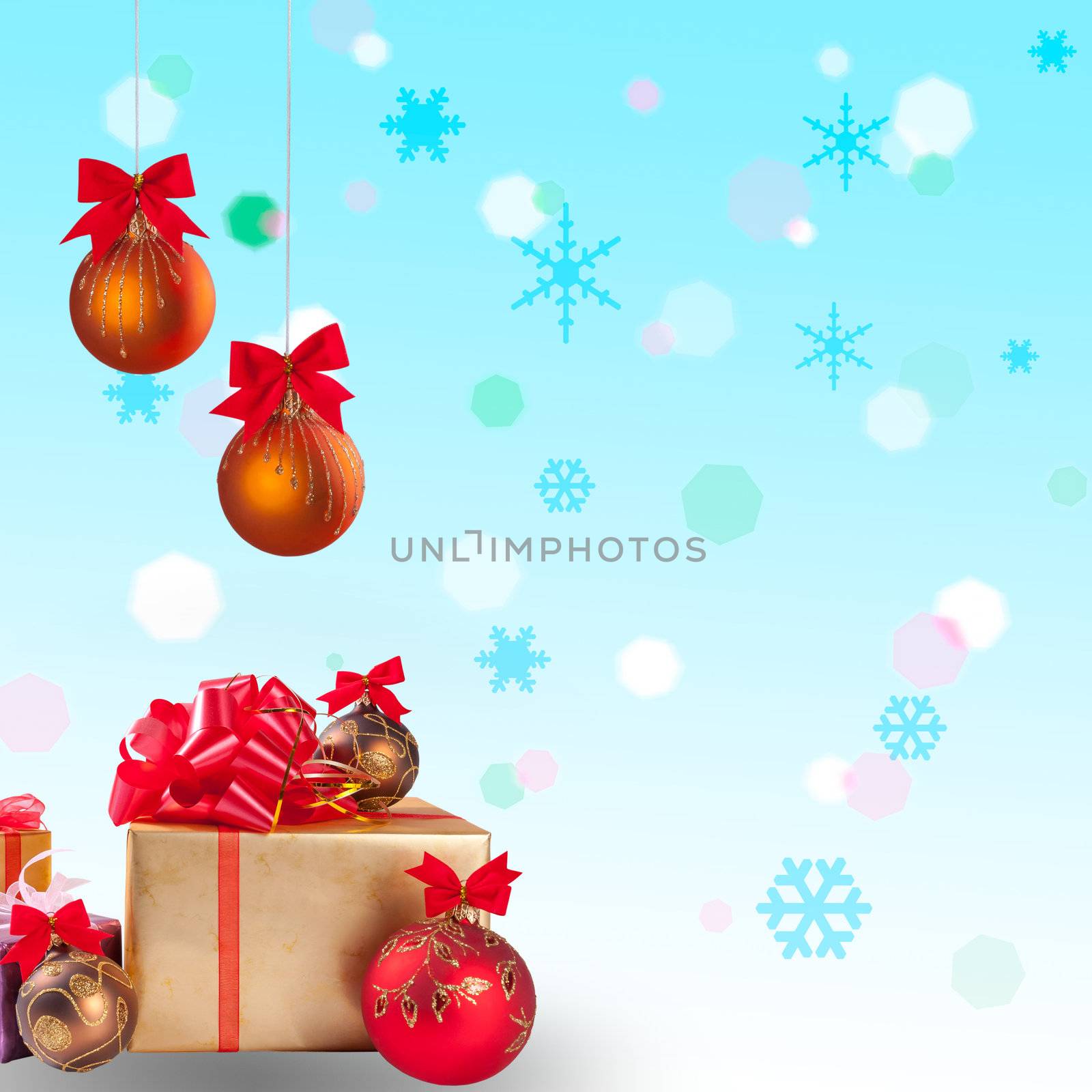 Christmas gift and balls with snow on festive background