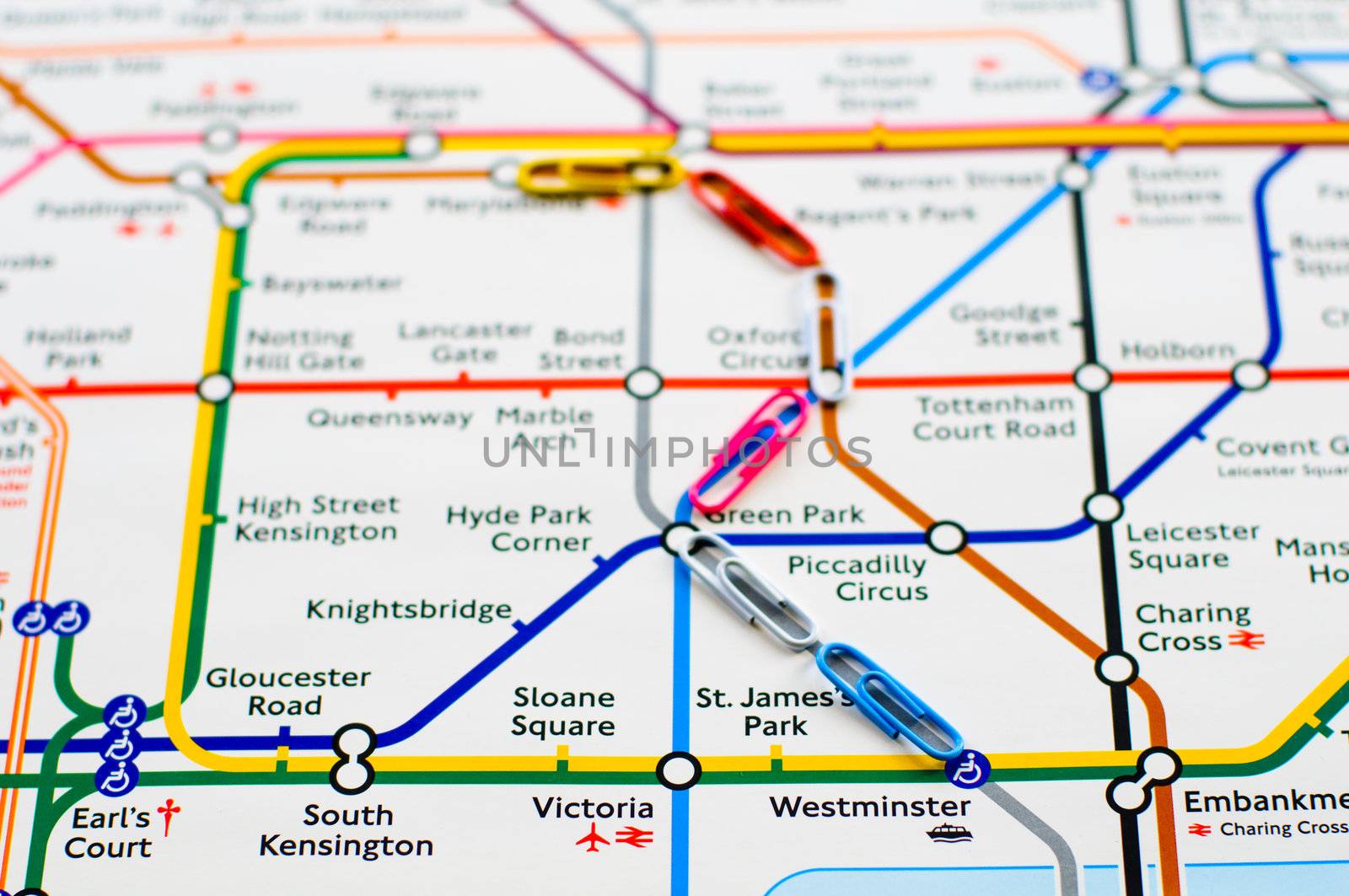 Variegated paperclips on the map of London metro