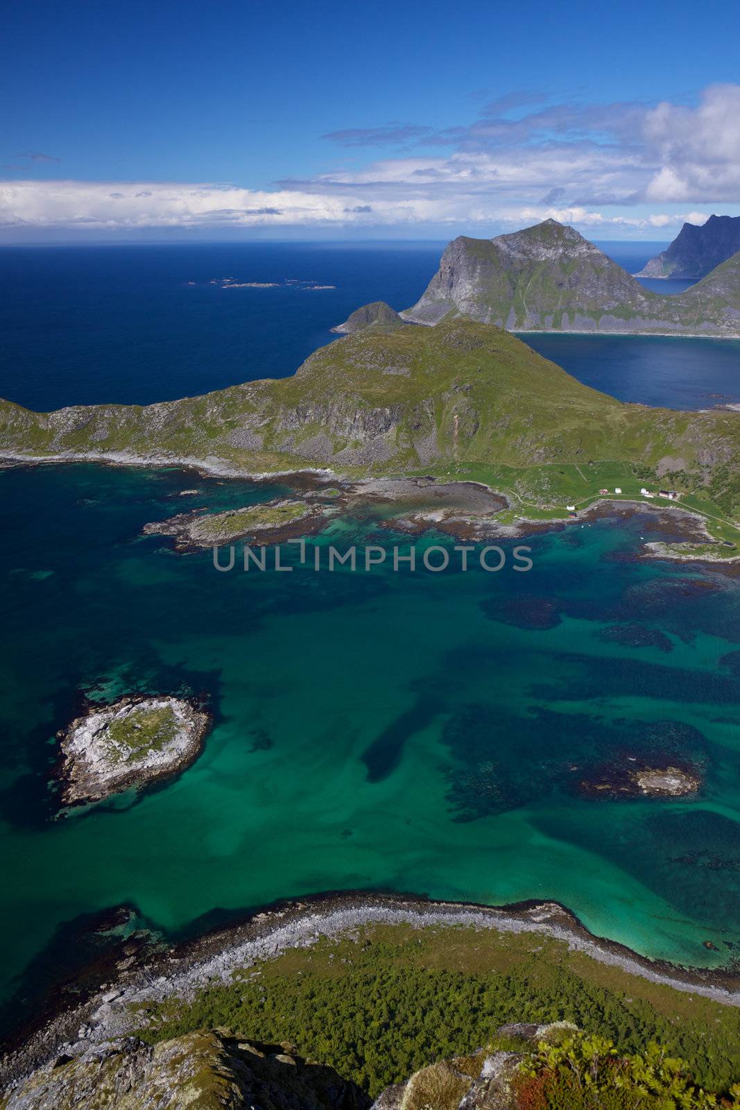 Picturesque view on Lofoten islands in Norway with high cliffs and deep fjords