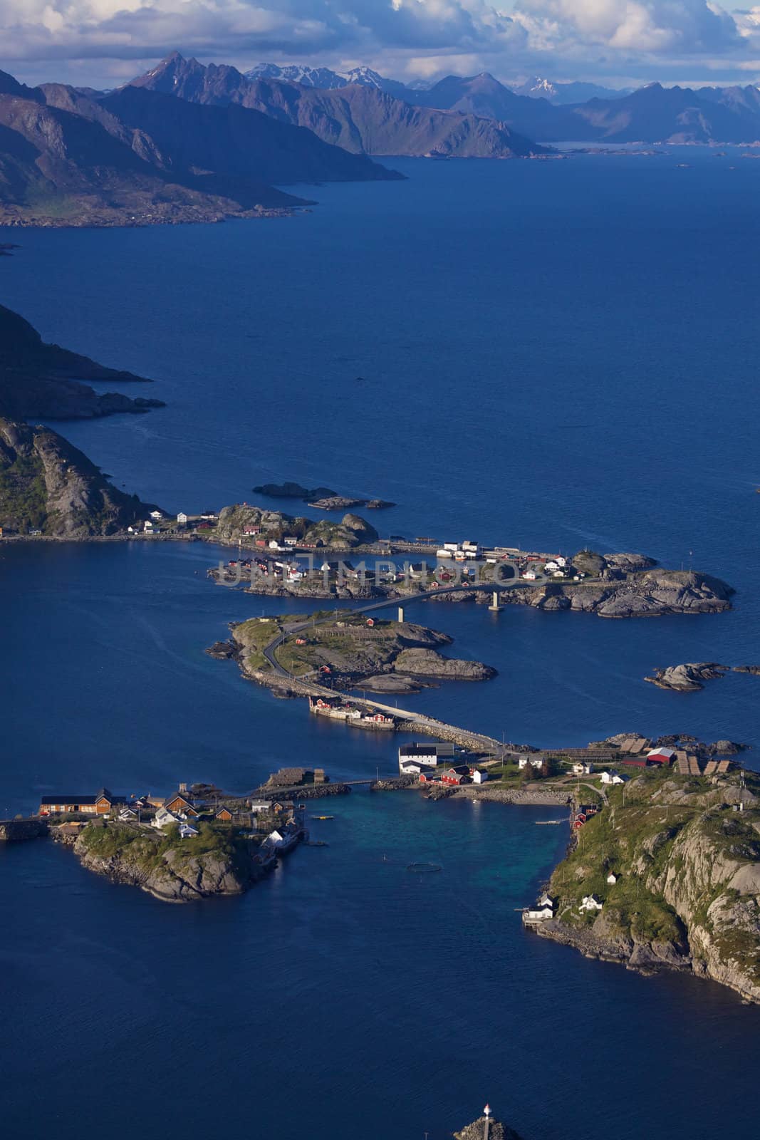 Picturesque view from Reinebringen with small fishing villages on tiny islands connected by bridges
