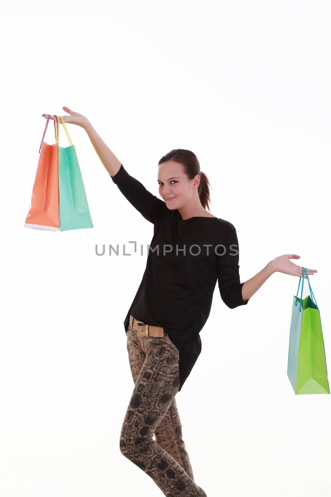 Young beautiful woman with shopping bags by shamtor