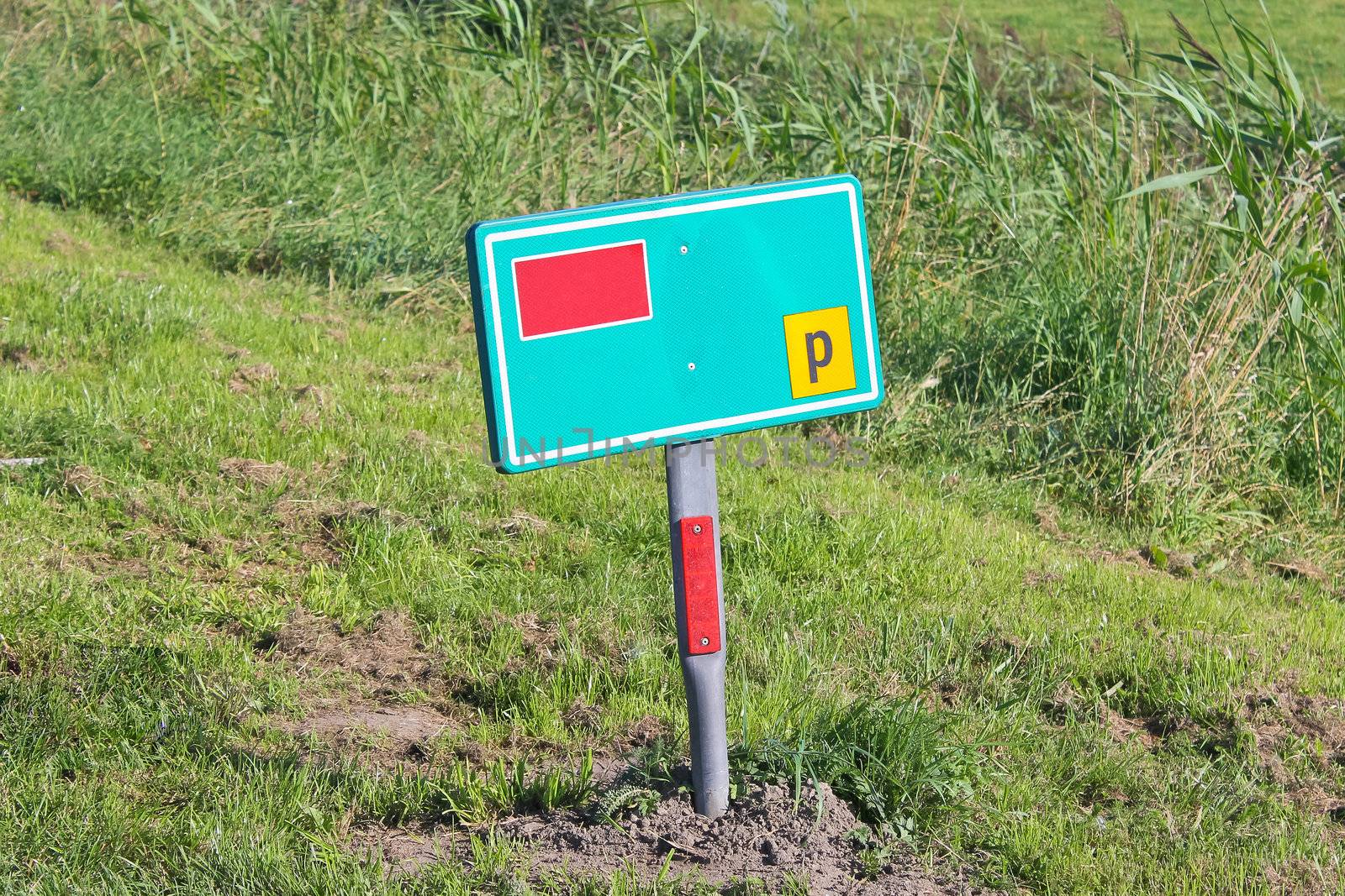 Road sign on the side of the road