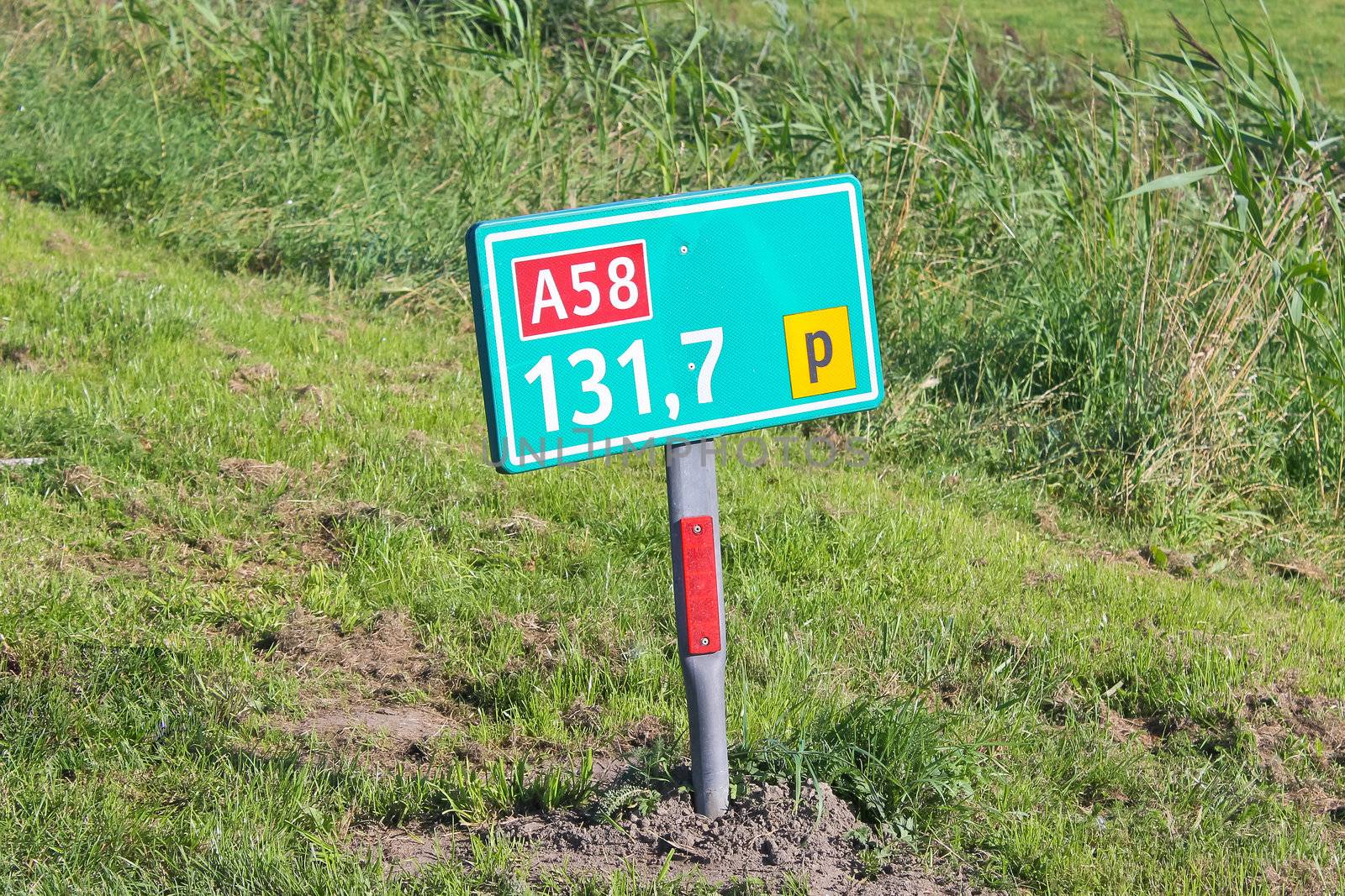Road sign on the side of the road