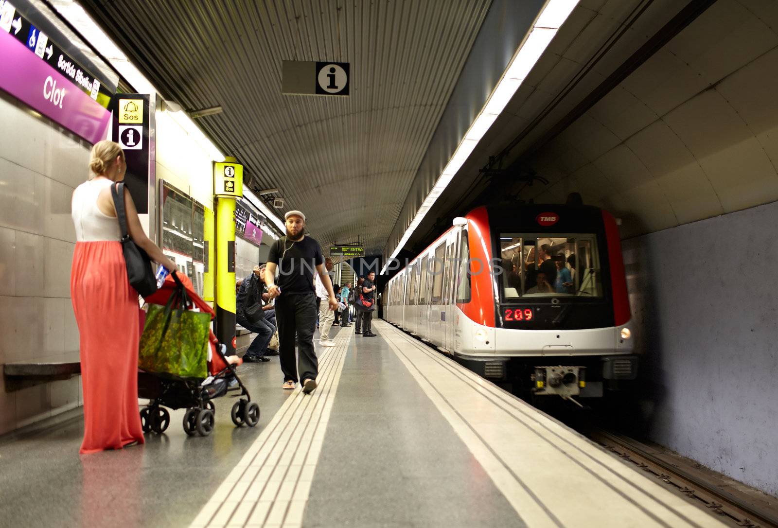 BARCELONA - MAY 25: The underground station 'Clot'. Passengers wait for the train on May 25, 2012 in Barcelona, Spain.
