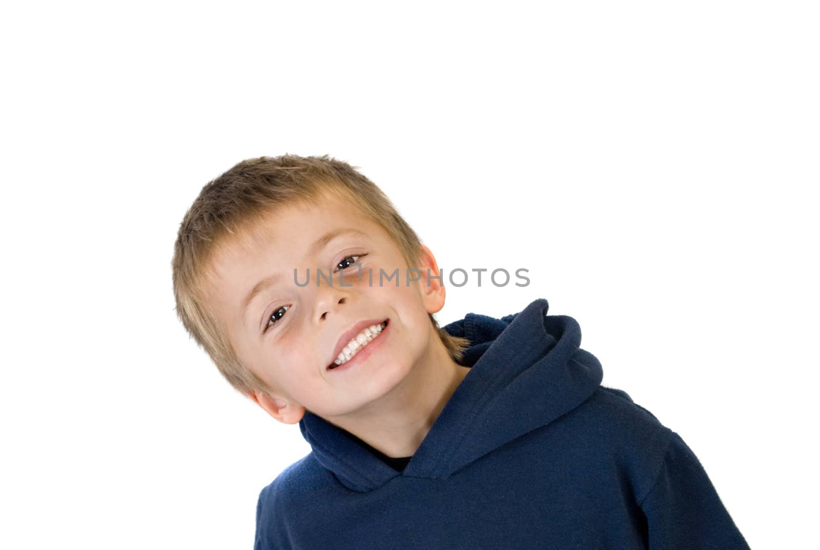 Happy boy showing healthy teeth