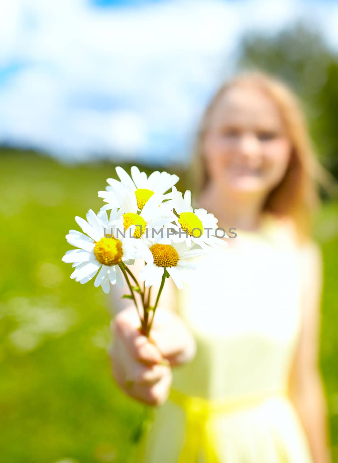 Girl with bunch of camomiles. by danr13