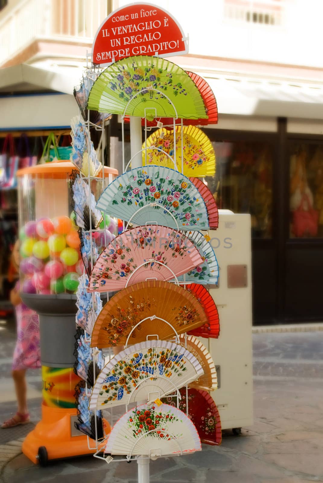 Colourful paper fans at a street market in italy