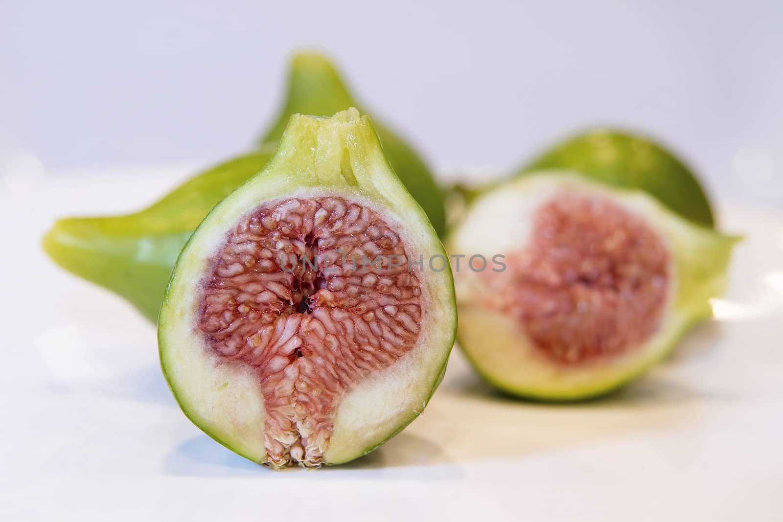 Fig Fruits Cut in Half Closeup by jpldesigns