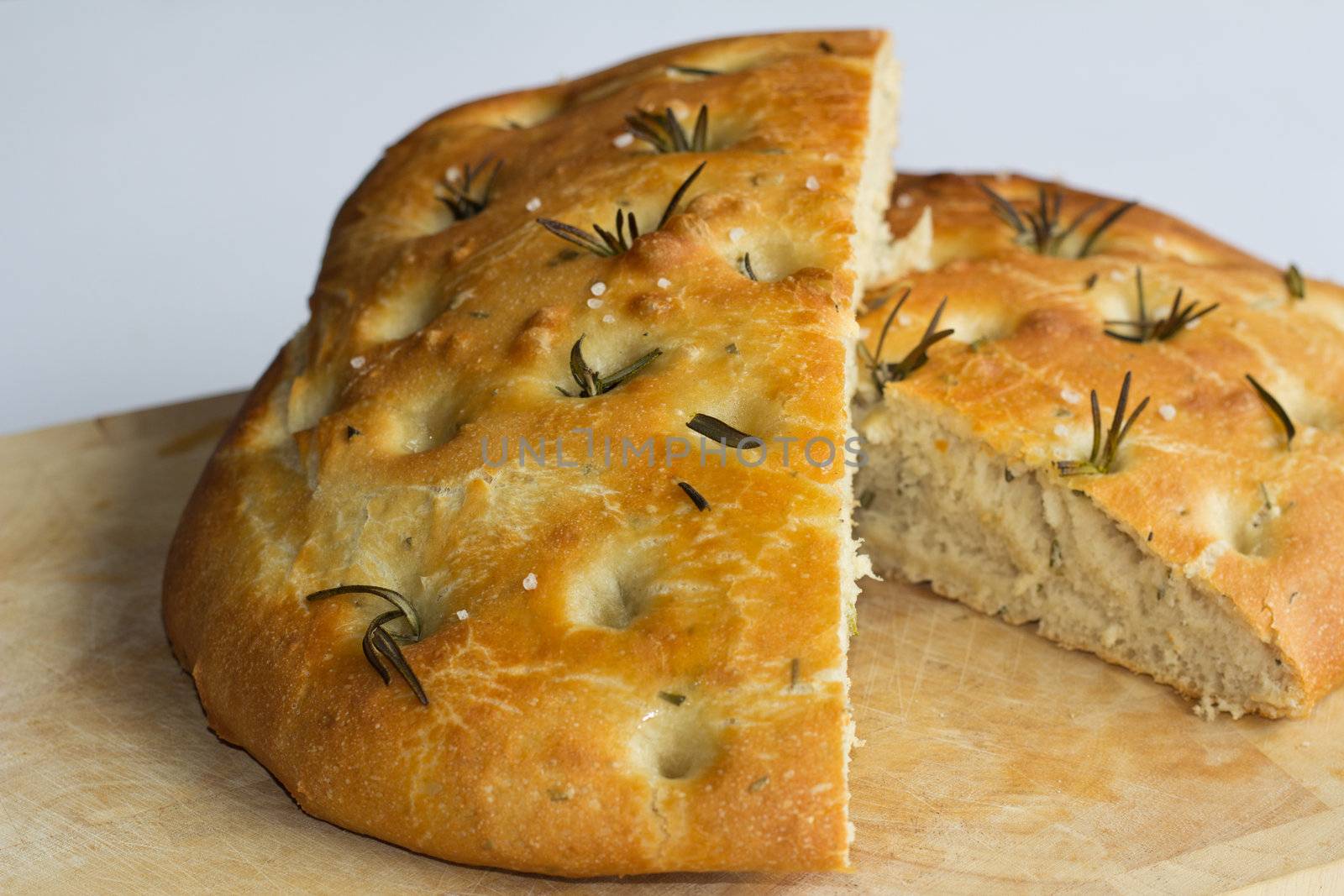 A loaf of freshly baked foccacia bread