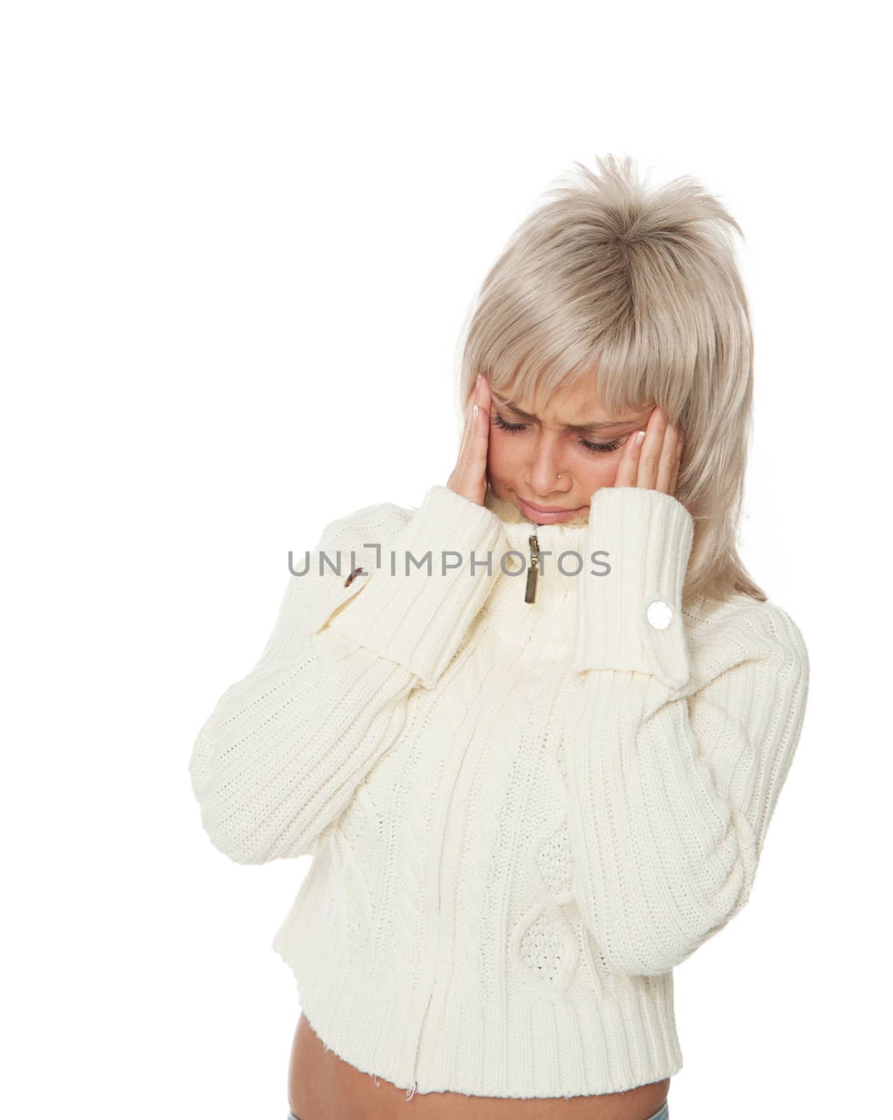 a woman in a white sweater headache