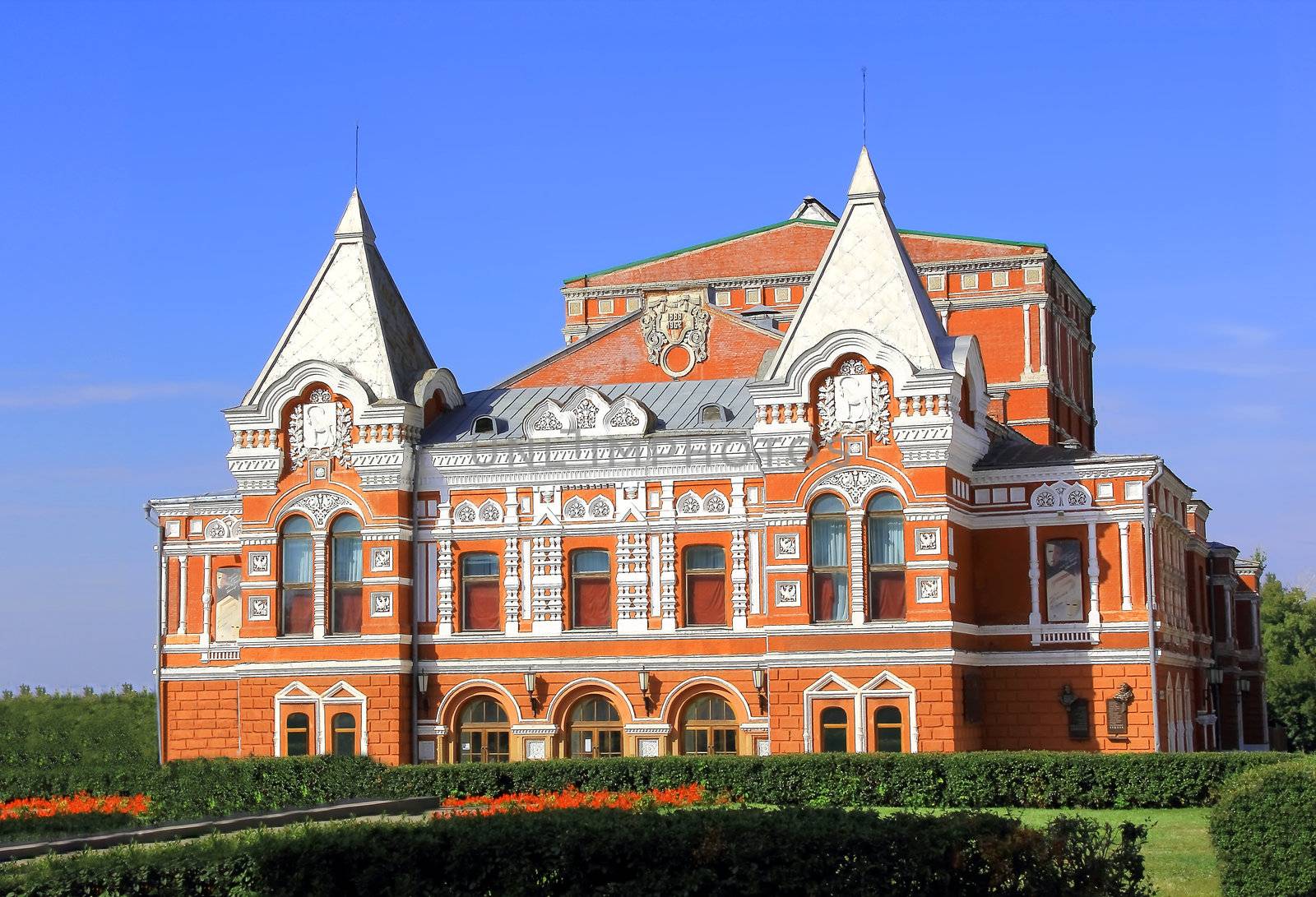 Town landscape with historic theater and blue sky