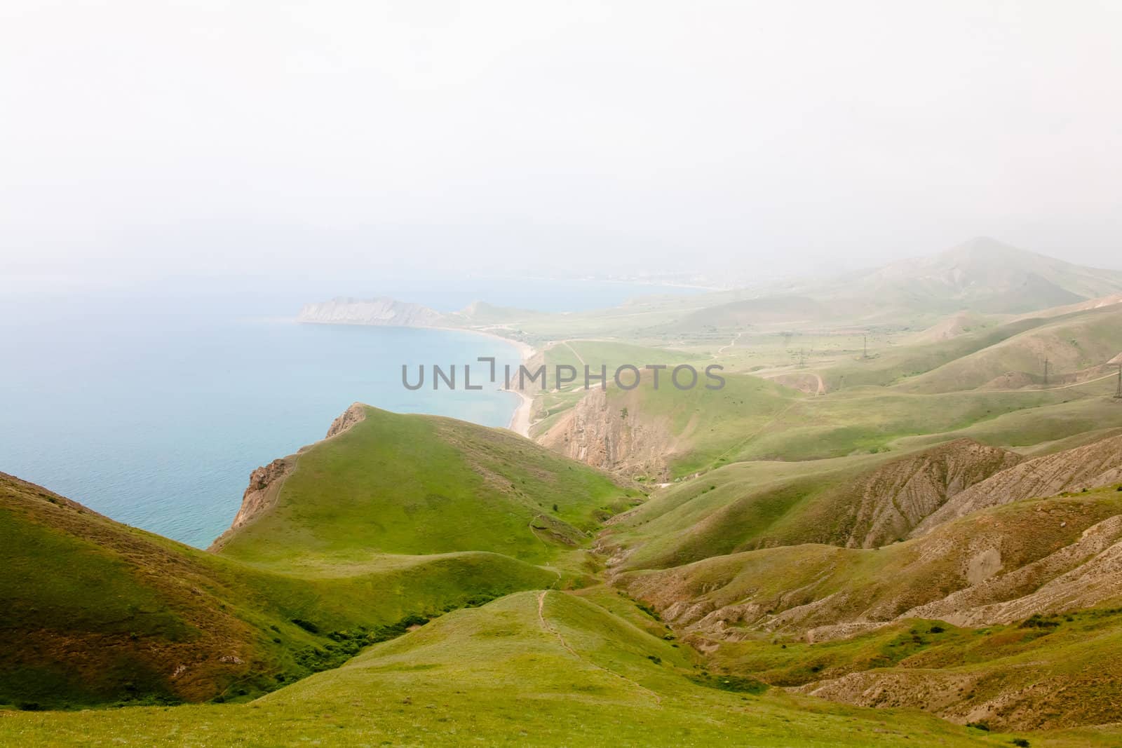 A summer landscape with sea and mountains
