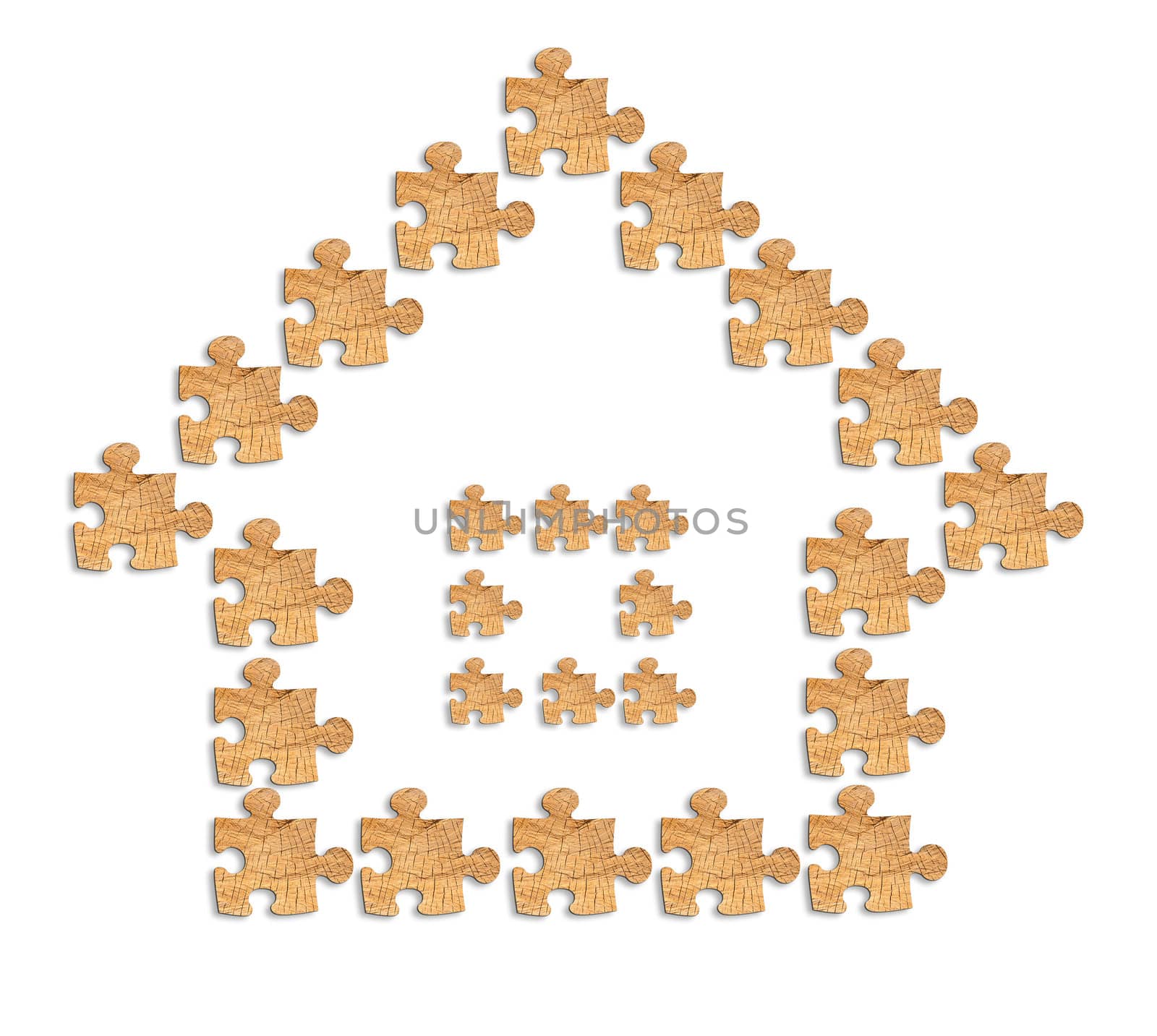 image of a house made of wooden figures puzzles with Clipping Path