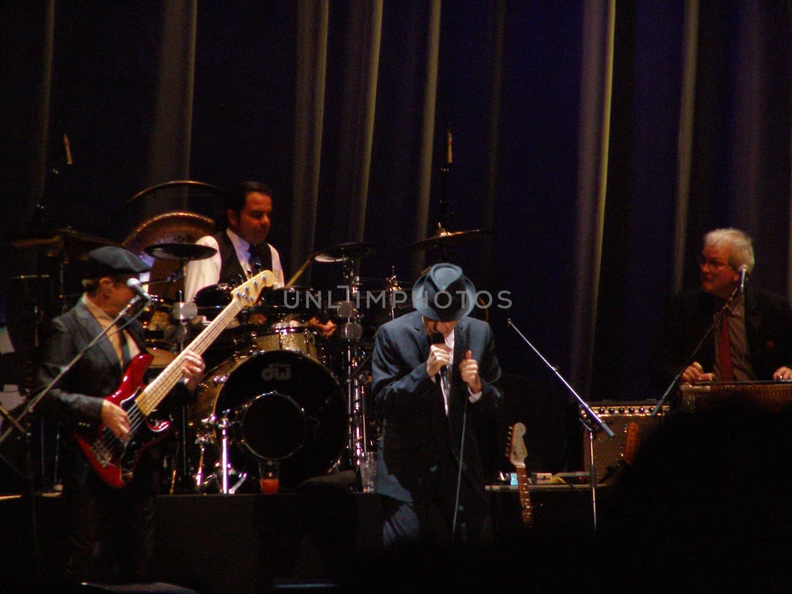 FLORENCE, SEPTEMBER 1ST: Leonard Cohen sings in front of a big audience for his only Italian date of the tour in Florence, piazza Santa Croce on September 1st, 2010.