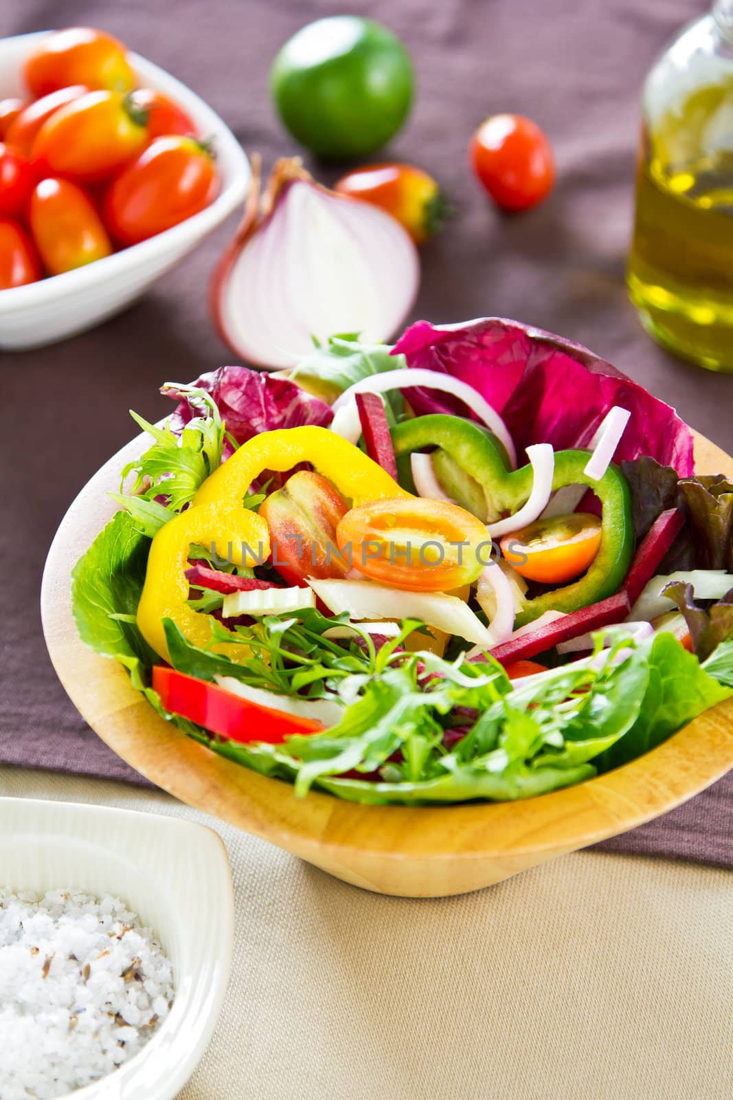 Vegetables salad in wood bowl by vanillaechoes
