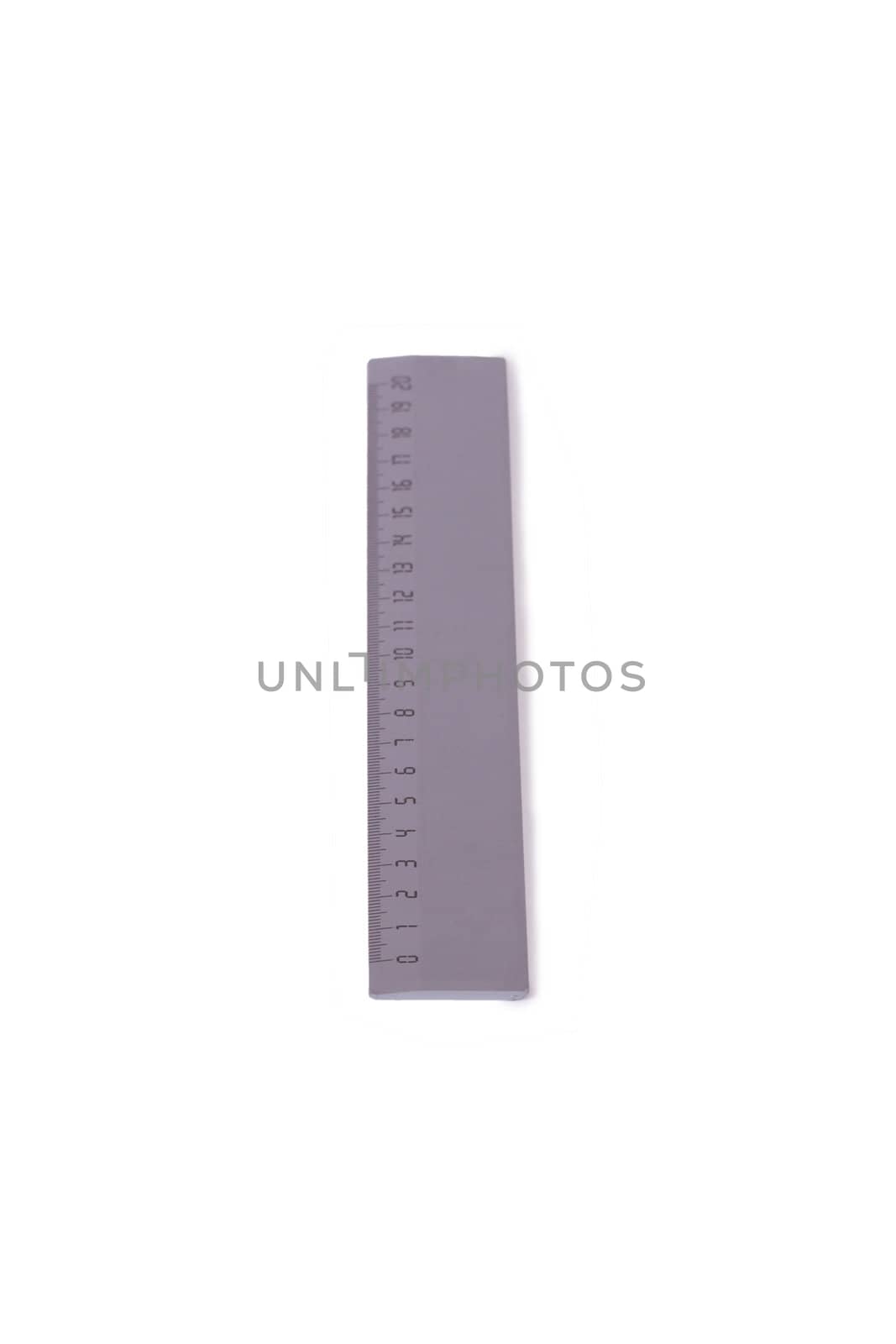 Gray plastic ruler isolated on white background