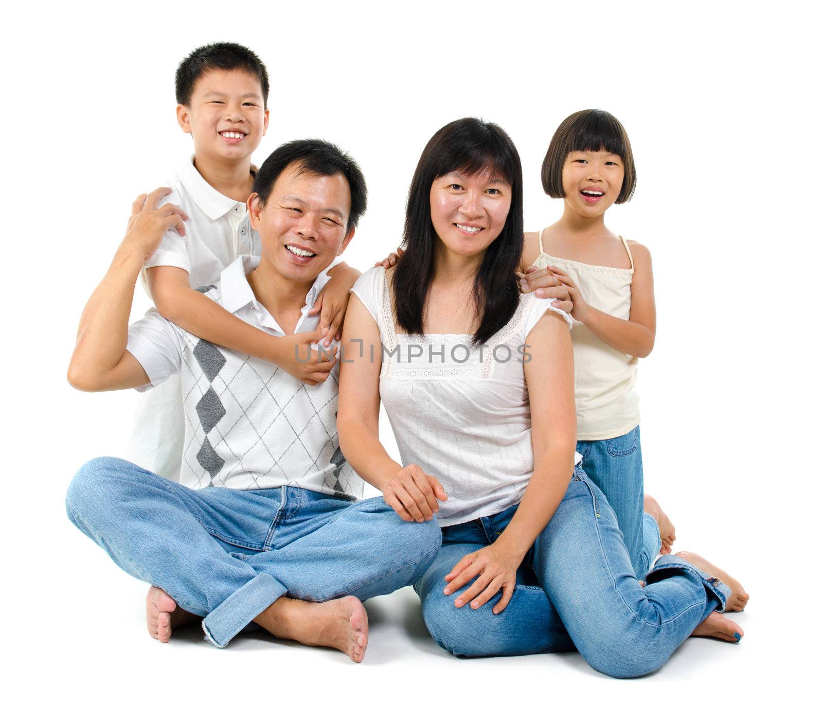Loving Asian family on white background