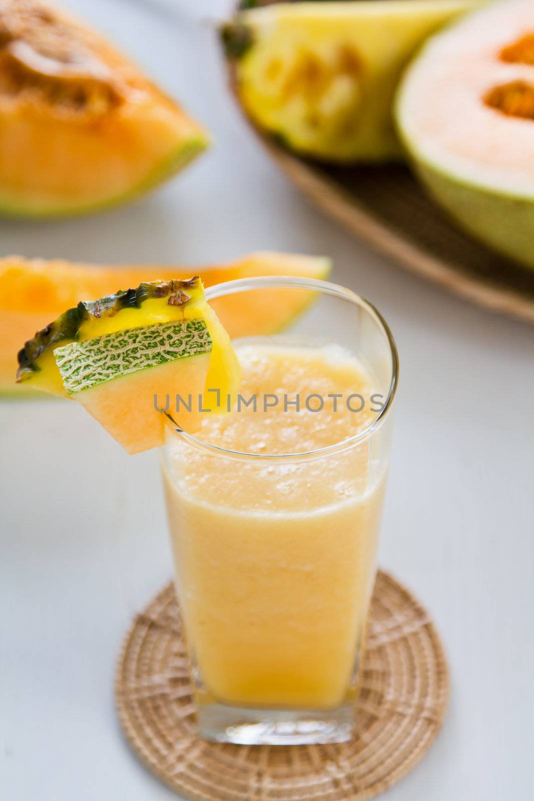 Cantaloupe and Pineapple smoothie by some fresh cantaloupe and pineapple