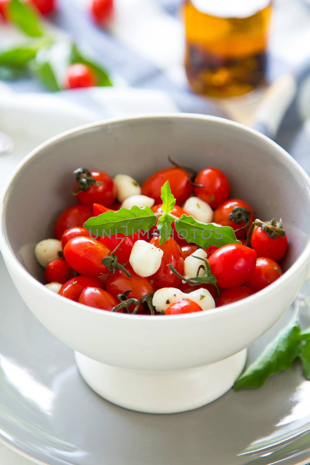 cherry tomato with pearl mozzarella and basil salad