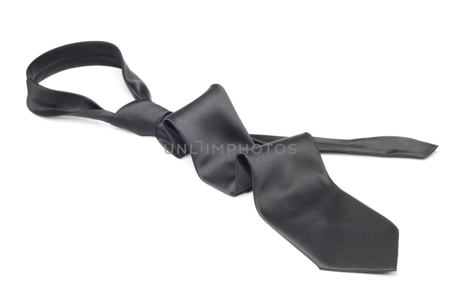 Black tie took off for leisure time, white background isolated