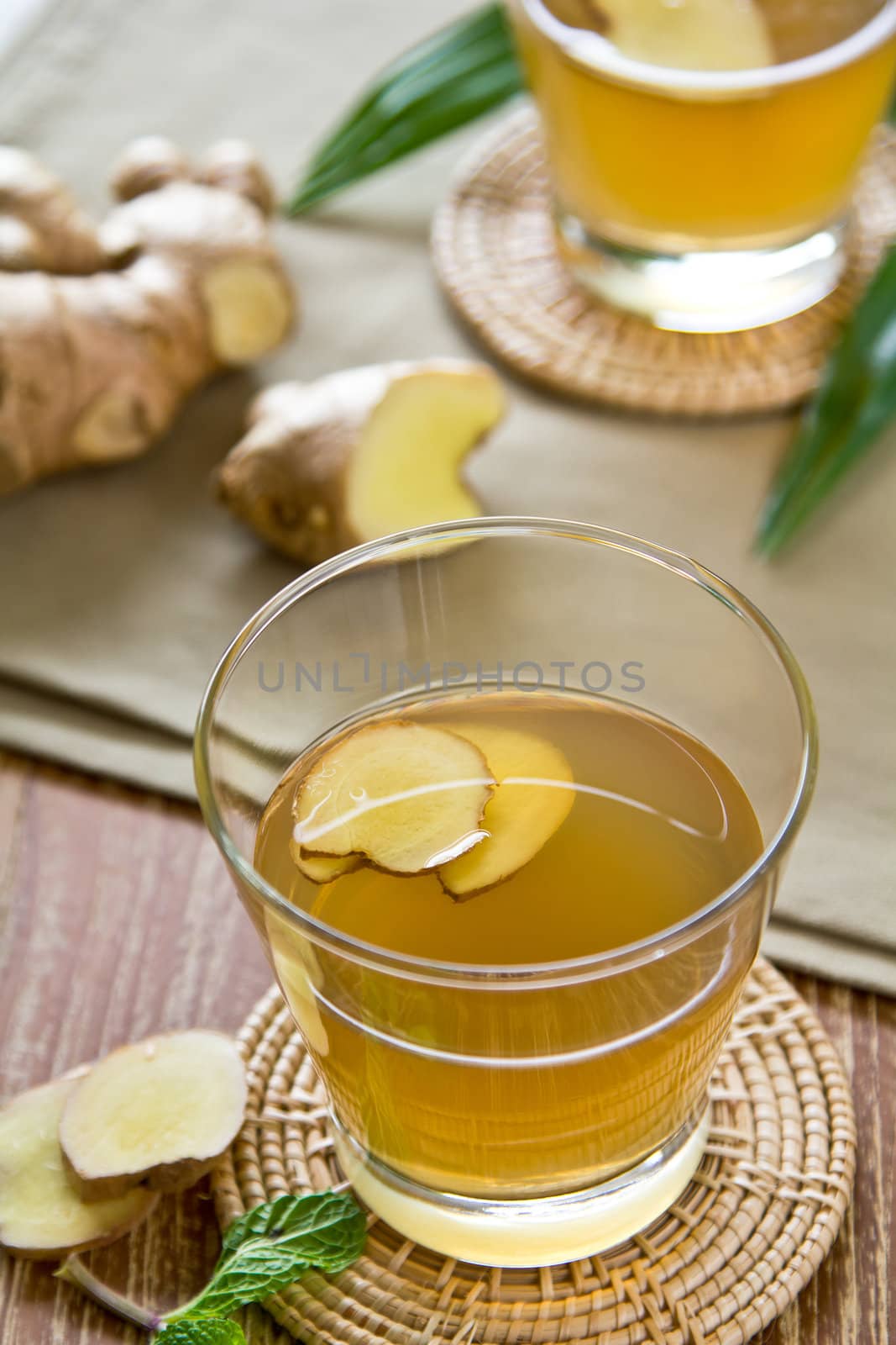 Warm Ginger drink with some fresh piece of ginger