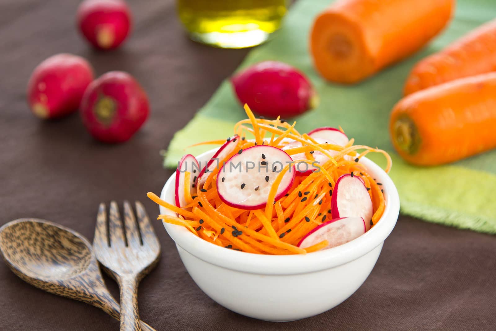 Grated carrot with radish and black sesame salad