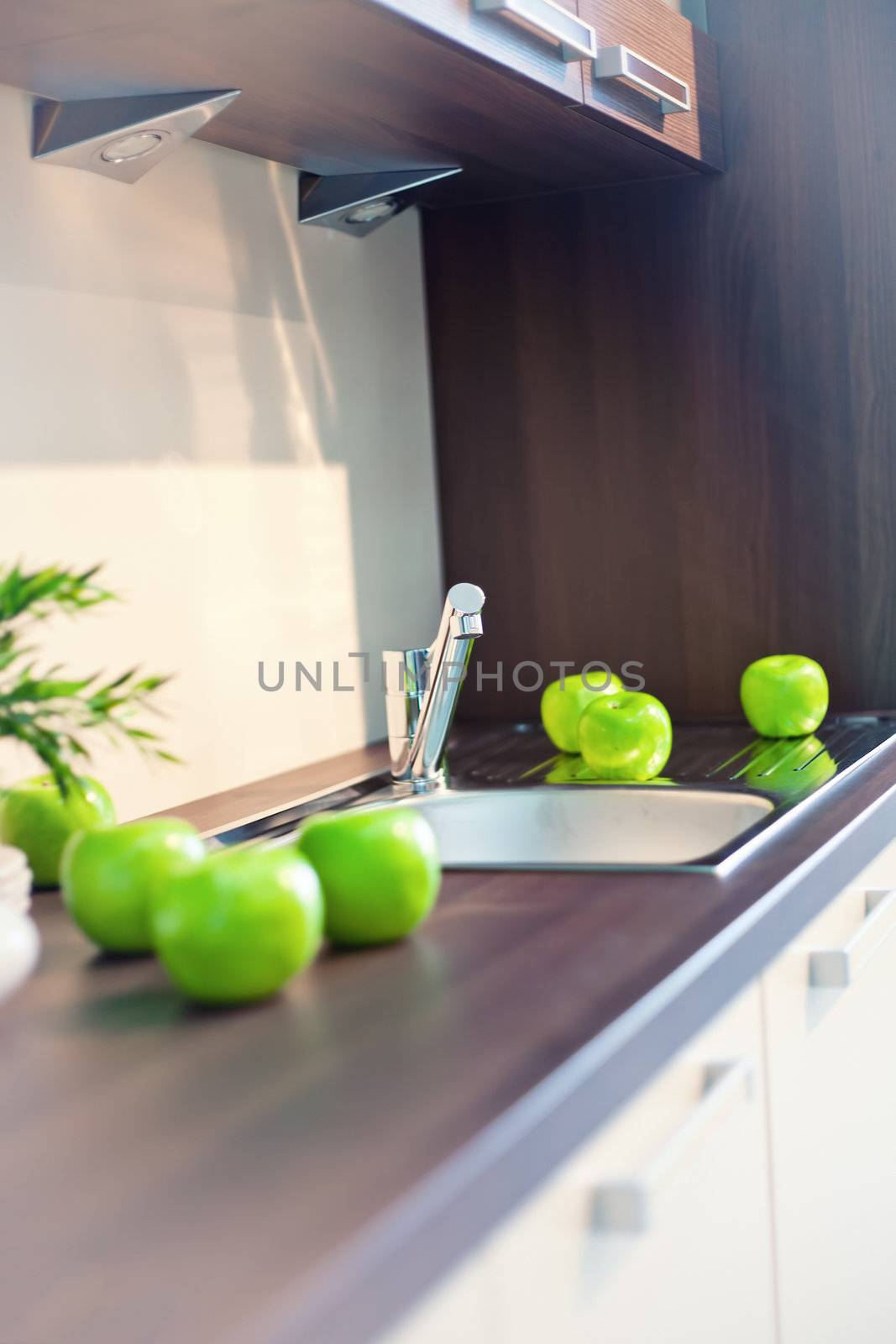  kitchen interior with fruits and dishes  on  countertop (beautiful Depth Of Field effect)
