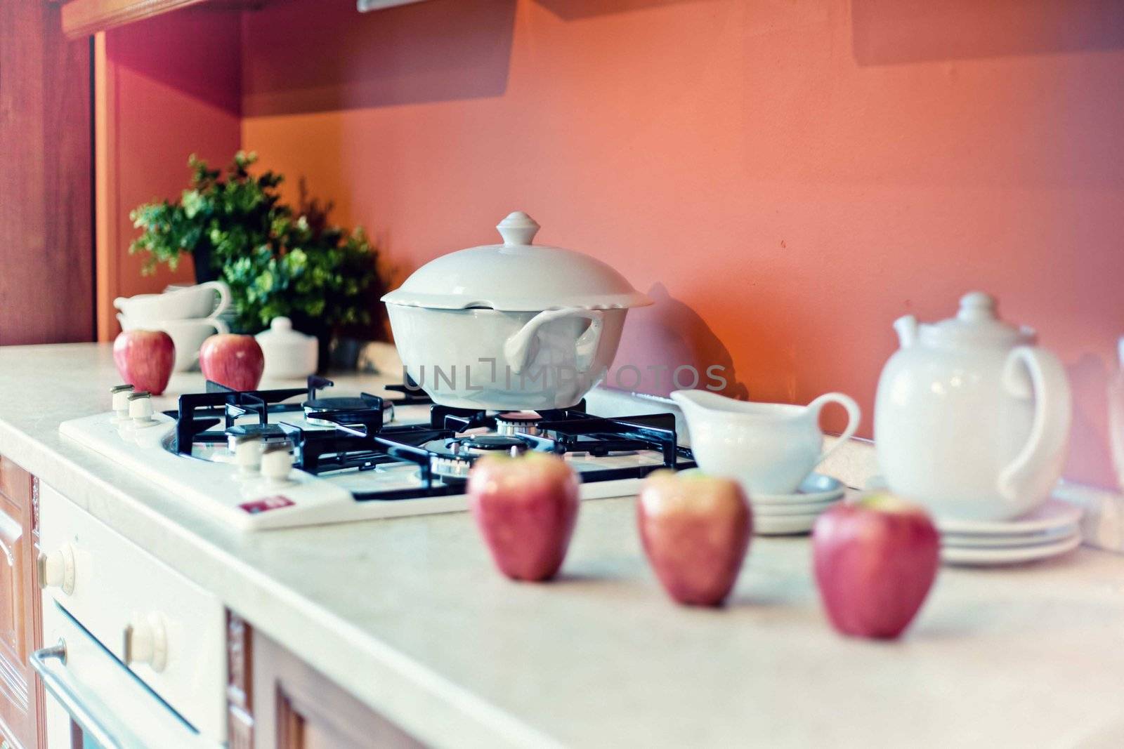  kitchen interior with fruits and dishes  on  countertop (beautiful Depth Of Field effect)
