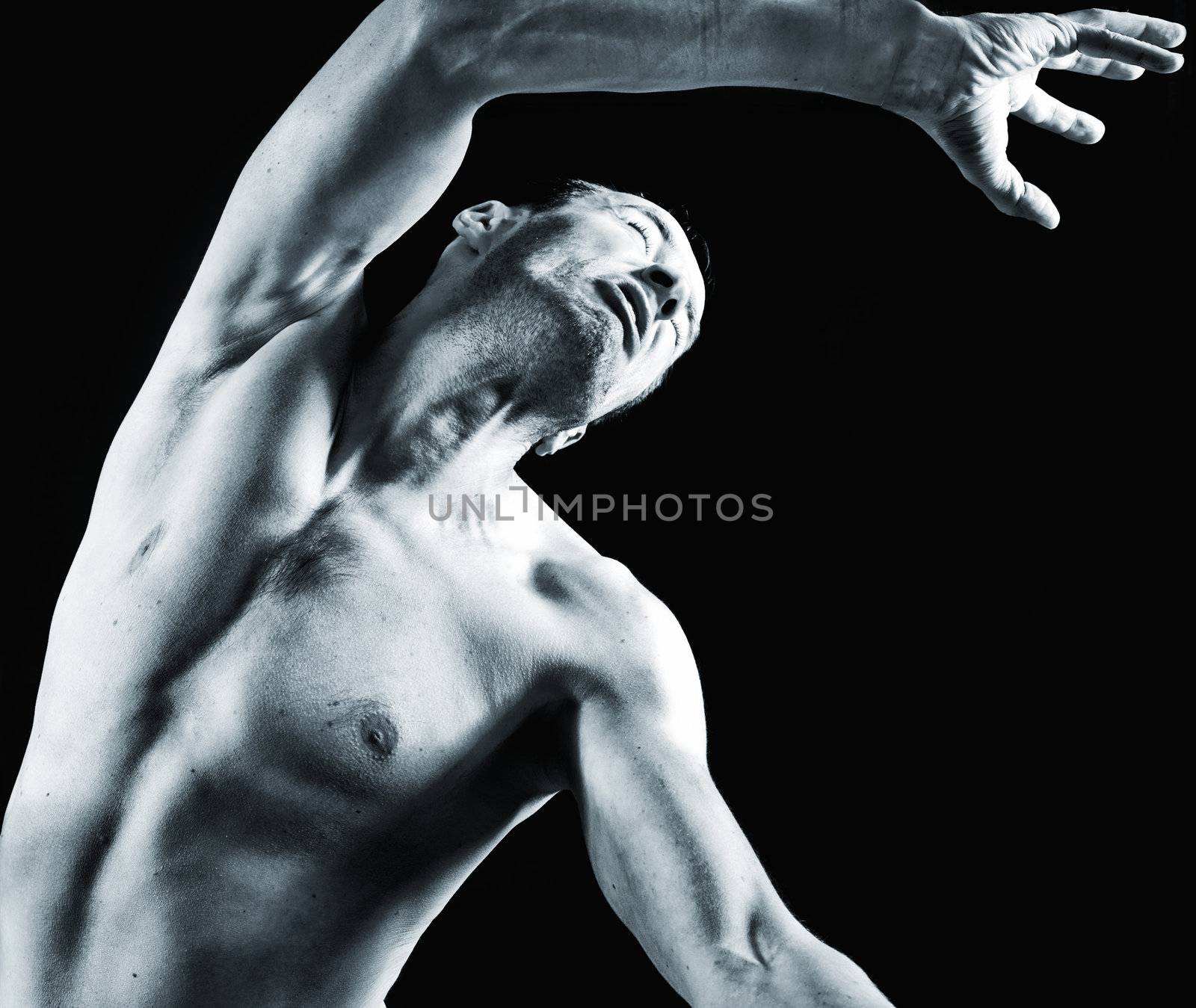 male muscular body in the snatch force (studio photo)