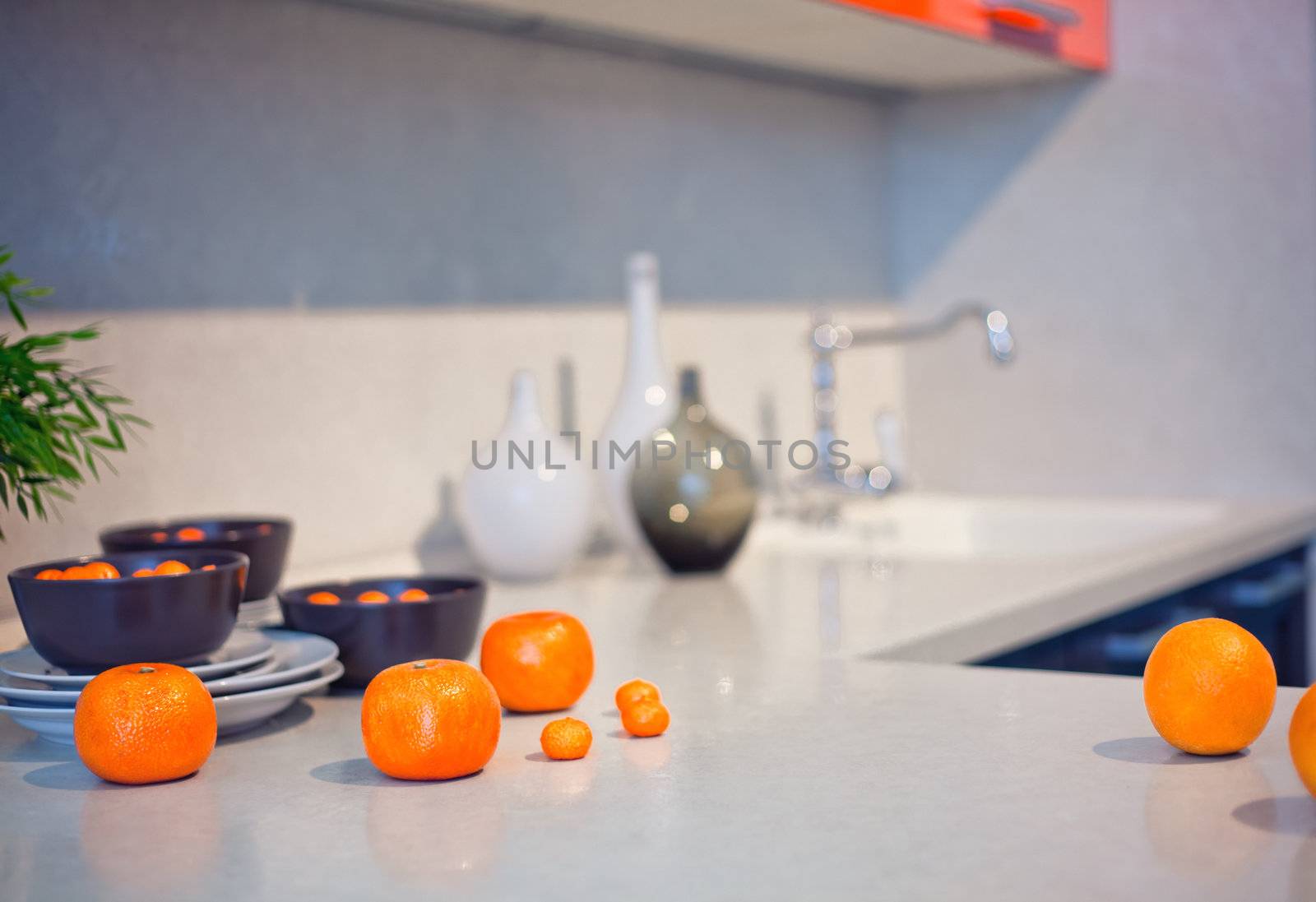  kitchen interior with fruits and dishes  on  countertop (beautiful Depth Of Field effect)
