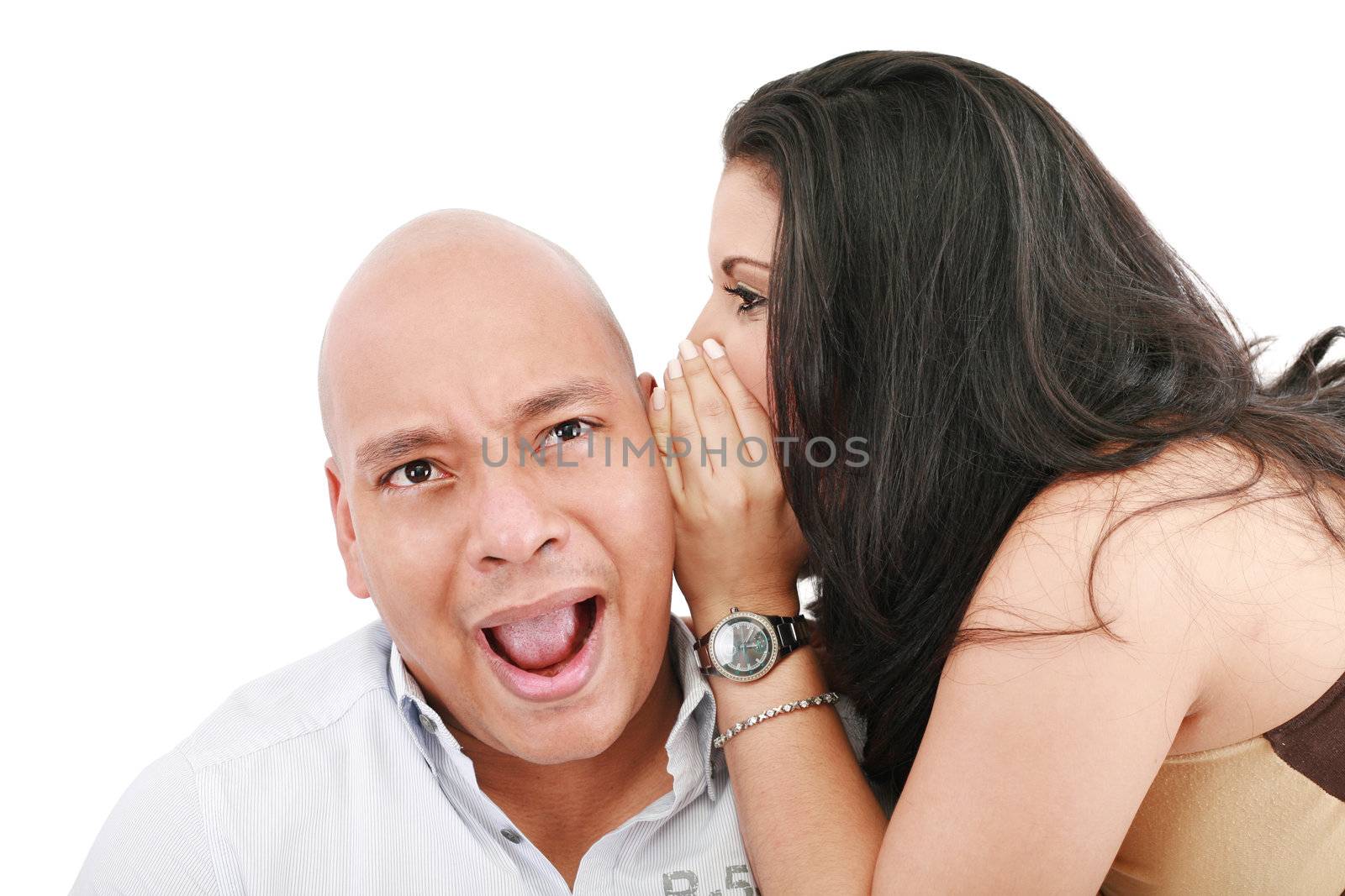 Closeup portrait of a cute young woman whispering in her husband by dacasdo