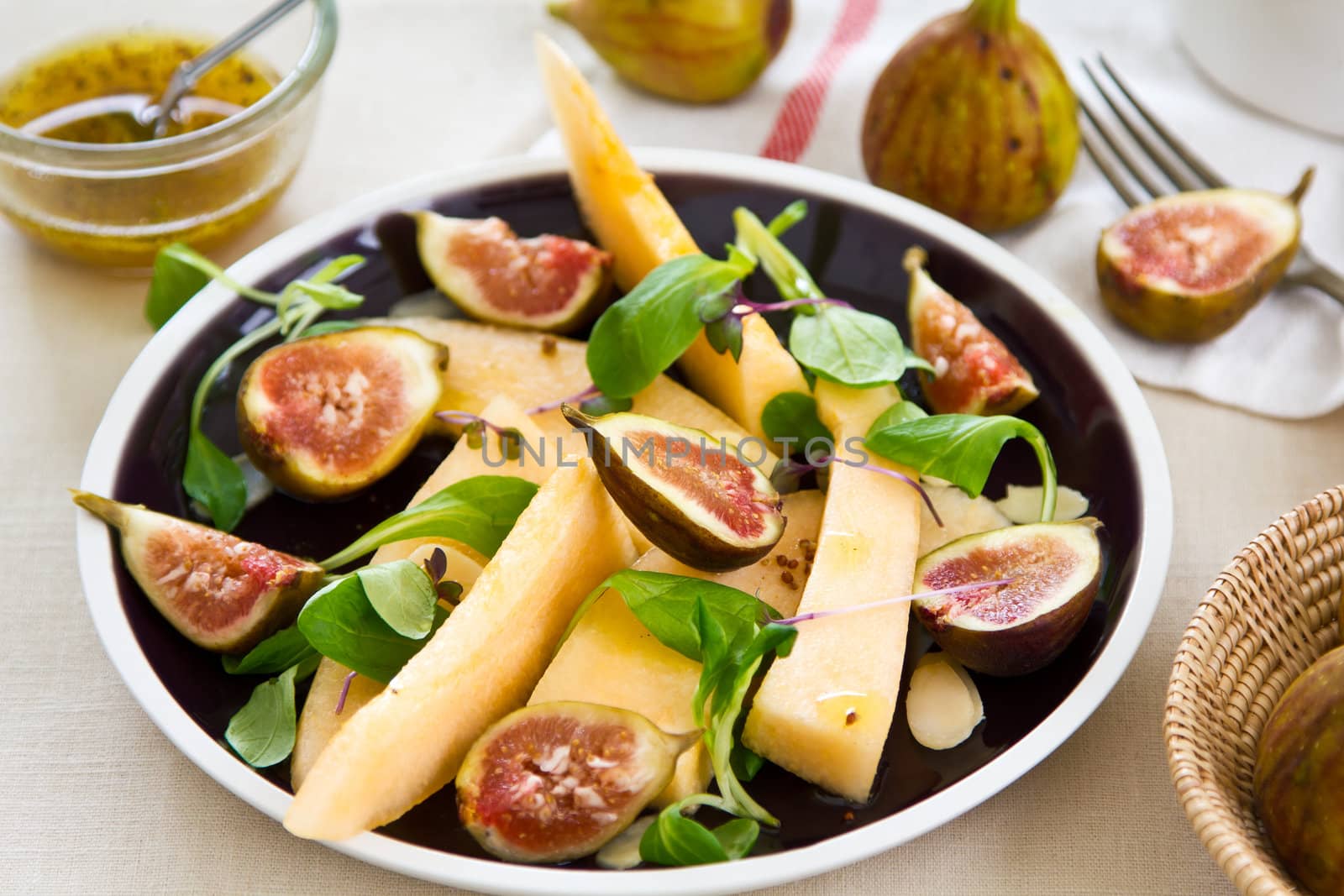 Fig,Cantaloupe and almond salad by vanillaechoes